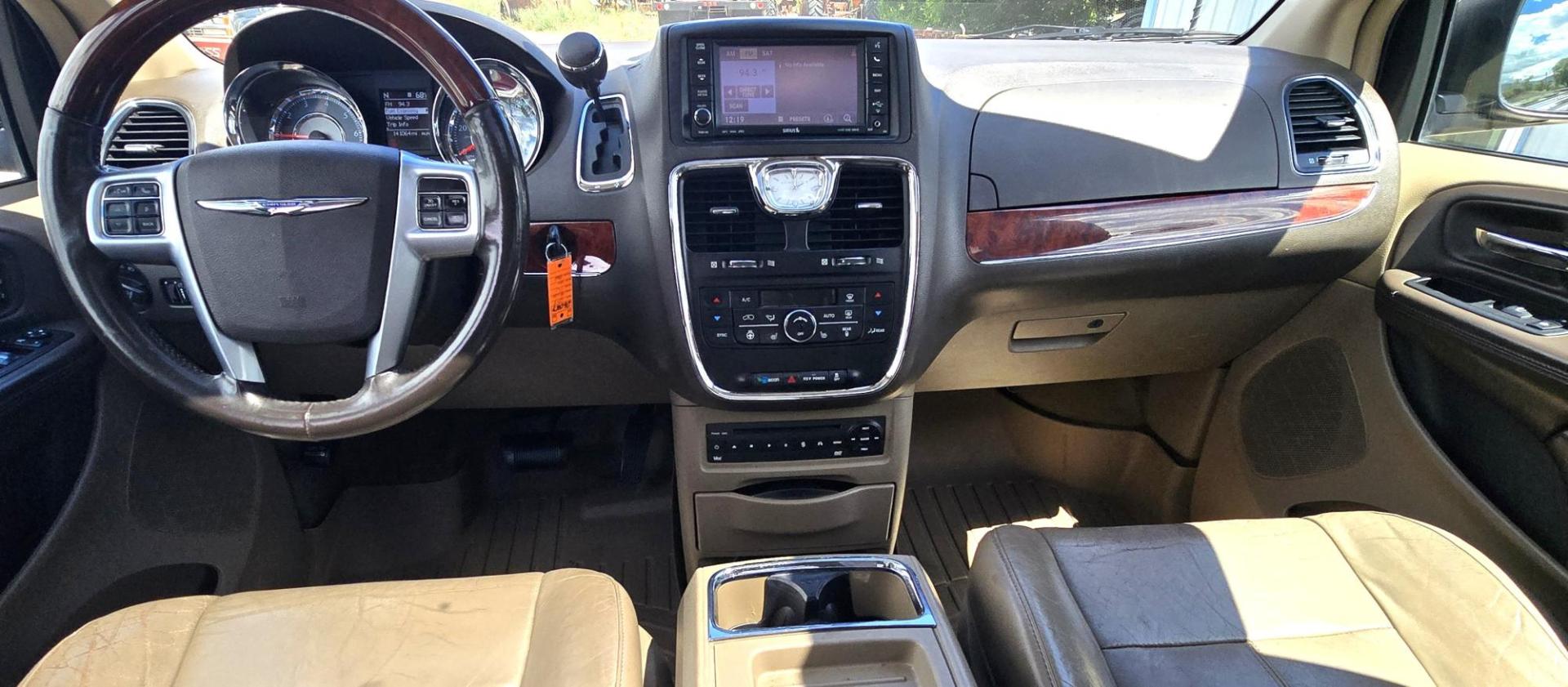 2013 Blue /Tan Chrysler Town & Country Limited (2C4RC1GG7DR) with an 3.6L V6 DOHC 24V engine, 6-Speed Automatic transmission, located at 450 N Russell, Missoula, MT, 59801, (406) 543-6600, 46.874496, -114.017433 - 2013 Town and Country FWD Mini-Van. These are getting hard to come by. This particular one has many features. 3.6L V6 Engine. 3rd Row Seating. Heated Front and Middle Seats. Heated Steering Wheel. DVD Entertainment System for the 2nd and 3rd Rows. Navigation. Bluetooth. AM FM SAT CD Player. Power Sl- Photo#16