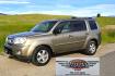 2011 Gold /Tan Honda Pilot EX-L 4WD 5-Spd AT (5FNYF4H57BB) with an 3.5L V6 SOHC 24V engine, 5-Speed Automatic transmission, located at 450 N Russell, Missoula, MT, 59801, (406) 543-6600, 46.874496, -114.017433 - Another great running Honda AWD. Reliable 3.5L V6 Engine. Heated Front Seats, 3rd Row Seats. Sunroof. Front and Rear Climate Control. Air. Cruise. Tilt. Power Windows and Locks. AM FM CD Changer. Tow Hitch. Clean Title and Carfax. Come by for a test drive. You won't be disappointed. - Photo#0