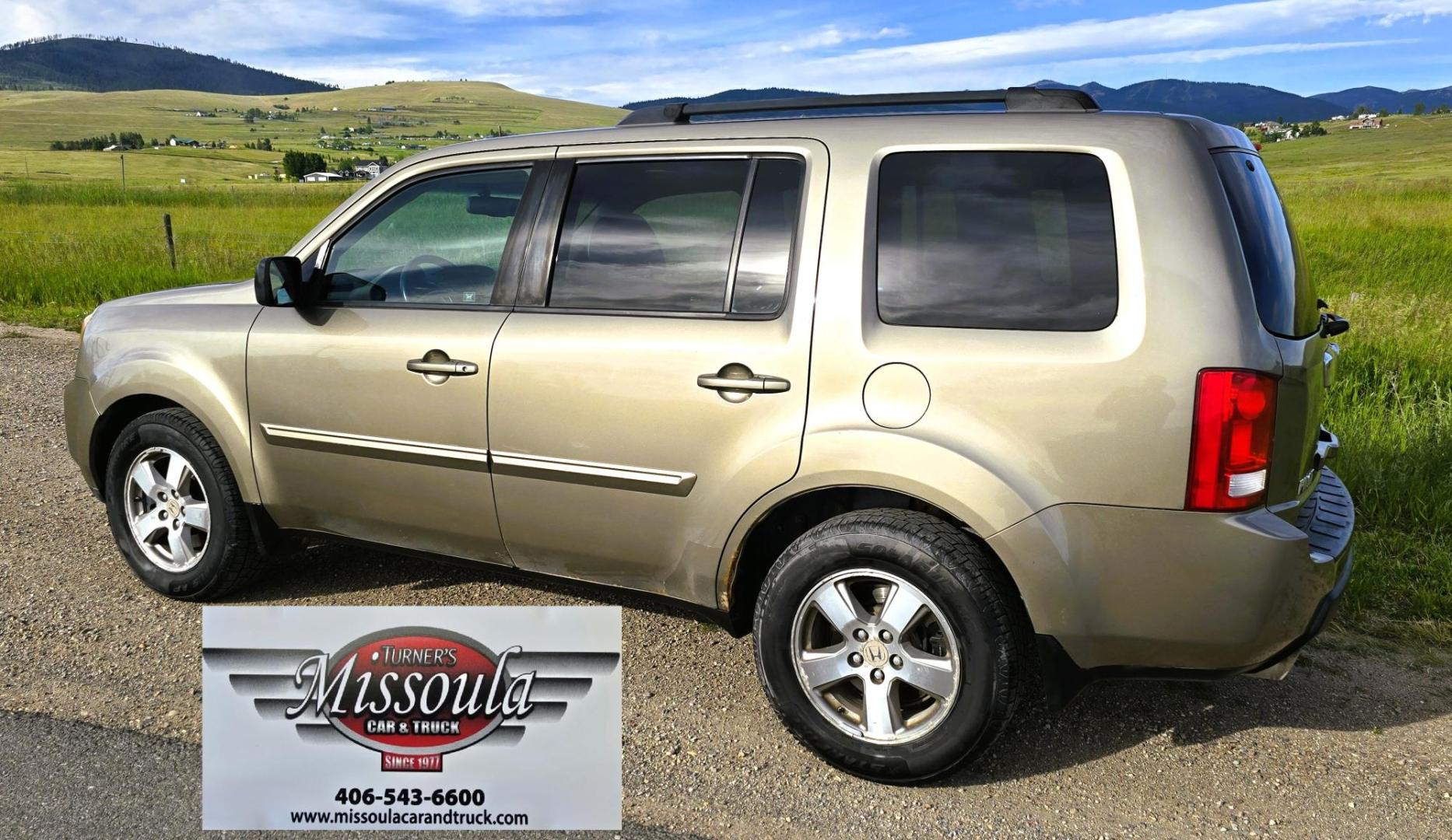 2011 Gold /Tan Honda Pilot EX-L 4WD 5-Spd AT (5FNYF4H57BB) with an 3.5L V6 SOHC 24V engine, 5-Speed Automatic transmission, located at 450 N Russell, Missoula, MT, 59801, (406) 543-6600, 46.874496, -114.017433 - Another great running Honda AWD. Reliable 3.5L V6 Engine. Heated Front Seats, 3rd Row Seats. Sunroof. Front and Rear Climate Control. Air. Cruise. Tilt. Power Windows and Locks. AM FM CD Changer. Tow Hitch. Clean Title and Carfax. Come by for a test drive. You won't be disappointed. - Photo#2
