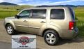 2011 Gold /Tan Honda Pilot EX-L 4WD 5-Spd AT (5FNYF4H57BB) with an 3.5L V6 SOHC 24V engine, 5-Speed Automatic transmission, located at 450 N Russell, Missoula, MT, 59801, (406) 543-6600, 46.874496, -114.017433 - Another great running Honda AWD. Reliable 3.5L V6 Engine. Heated Front Seats, 3rd Row Seats. Sunroof. Front and Rear Climate Control. Air. Cruise. Tilt. Power Windows and Locks. AM FM CD Changer. Tow Hitch. Clean Title and Carfax. Come by for a test drive. You won't be disappointed. - Photo#2