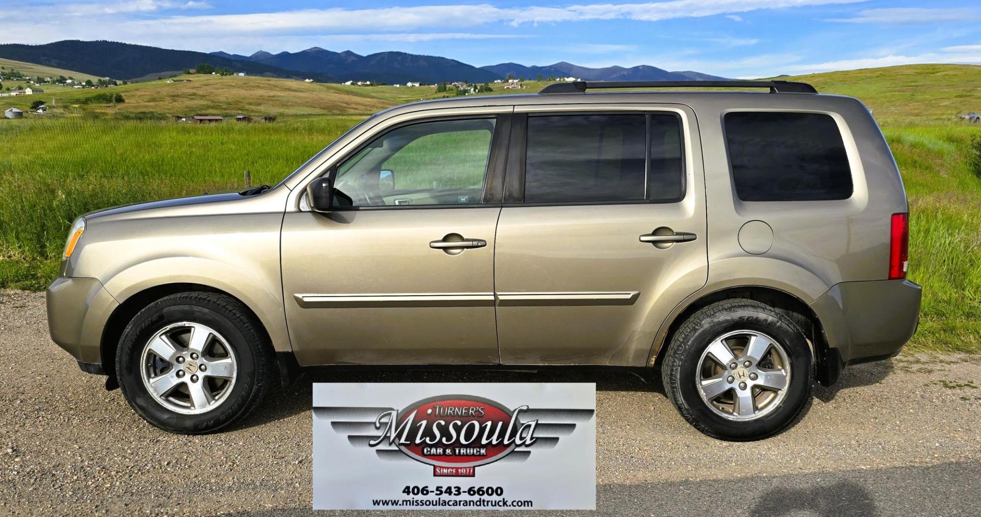 2011 Gold /Tan Honda Pilot EX-L 4WD 5-Spd AT (5FNYF4H57BB) with an 3.5L V6 SOHC 24V engine, 5-Speed Automatic transmission, located at 450 N Russell, Missoula, MT, 59801, (406) 543-6600, 46.874496, -114.017433 - Another great running Honda AWD. Reliable 3.5L V6 Engine. Heated Front Seats, 3rd Row Seats. Sunroof. Front and Rear Climate Control. Air. Cruise. Tilt. Power Windows and Locks. AM FM CD Changer. Tow Hitch. Clean Title and Carfax. Come by for a test drive. You won't be disappointed. - Photo#1