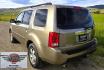 2011 Gold /Tan Honda Pilot EX-L 4WD 5-Spd AT (5FNYF4H57BB) with an 3.5L V6 SOHC 24V engine, 5-Speed Automatic transmission, located at 450 N Russell, Missoula, MT, 59801, (406) 543-6600, 46.874496, -114.017433 - Another great running Honda AWD. Reliable 3.5L V6 Engine. Heated Front Seats, 3rd Row Seats. Sunroof. Front and Rear Climate Control. Air. Cruise. Tilt. Power Windows and Locks. AM FM CD Changer. Tow Hitch. Clean Title and Carfax. Come by for a test drive. You won't be disappointed. - Photo#3