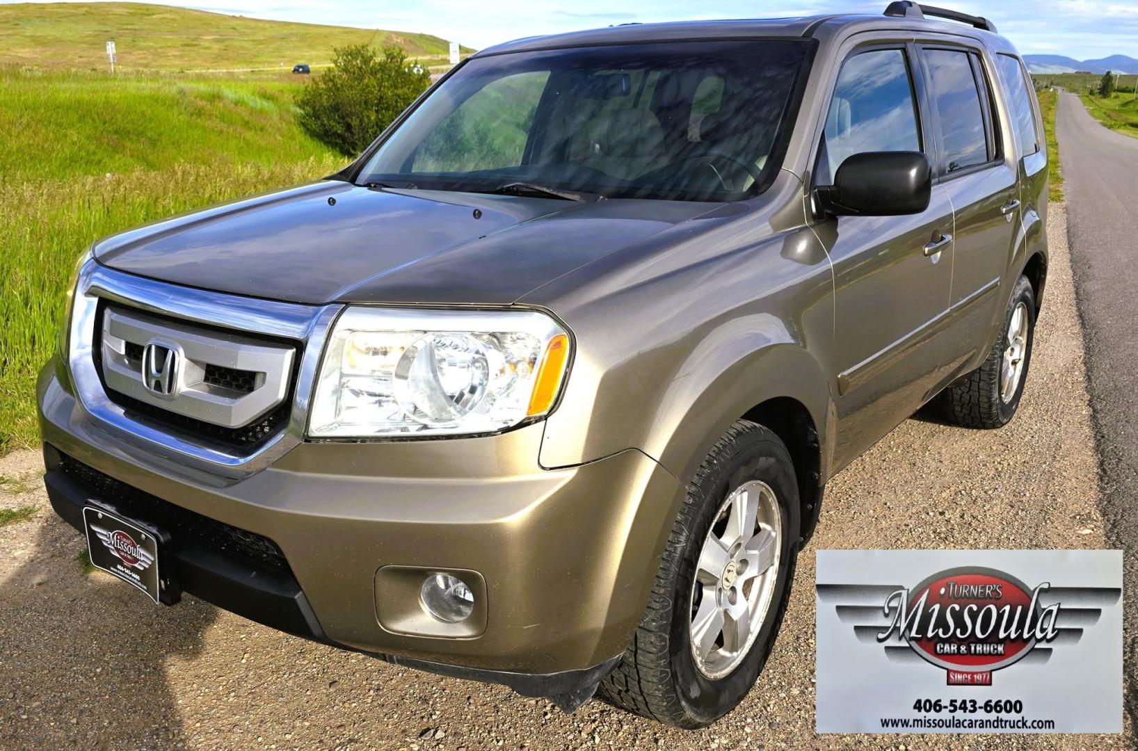 2011 Gold /Tan Honda Pilot EX-L 4WD 5-Spd AT (5FNYF4H57BB) with an 3.5L V6 SOHC 24V engine, 5-Speed Automatic transmission, located at 450 N Russell, Missoula, MT, 59801, (406) 543-6600, 46.874496, -114.017433 - Another great running Honda AWD. Reliable 3.5L V6 Engine. Heated Front Seats, 3rd Row Seats. Sunroof. Front and Rear Climate Control. Air. Cruise. Tilt. Power Windows and Locks. AM FM CD Changer. Tow Hitch. Clean Title and Carfax. Come by for a test drive. You won't be disappointed. - Photo#4
