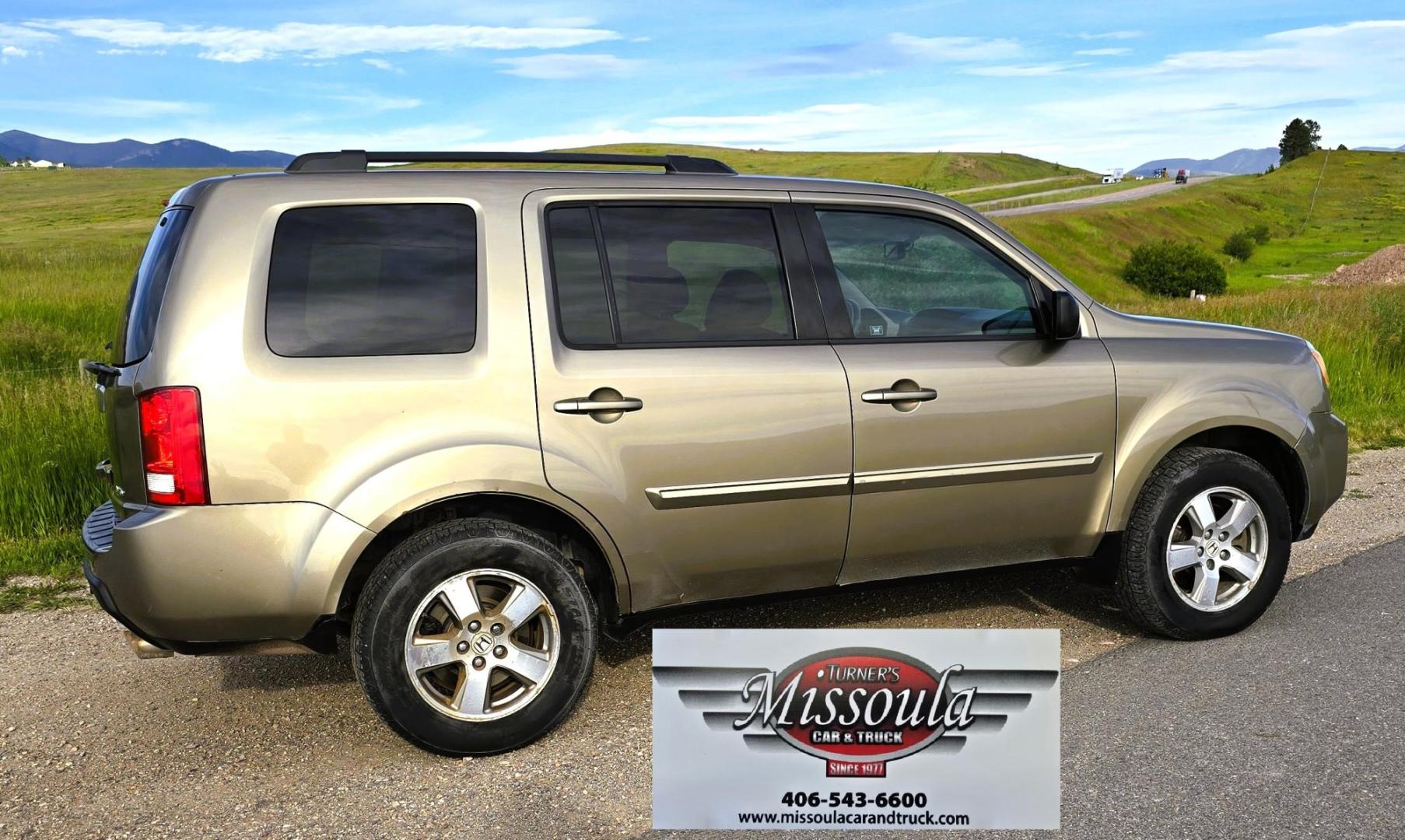 2011 Gold /Tan Honda Pilot EX-L 4WD 5-Spd AT (5FNYF4H57BB) with an 3.5L V6 SOHC 24V engine, 5-Speed Automatic transmission, located at 450 N Russell, Missoula, MT, 59801, (406) 543-6600, 46.874496, -114.017433 - Another great running Honda AWD. Reliable 3.5L V6 Engine. Heated Front Seats, 3rd Row Seats. Sunroof. Front and Rear Climate Control. Air. Cruise. Tilt. Power Windows and Locks. AM FM CD Changer. Tow Hitch. Clean Title and Carfax. Come by for a test drive. You won't be disappointed. - Photo#5