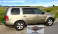 2011 Gold /Tan Honda Pilot EX-L 4WD 5-Spd AT (5FNYF4H57BB) with an 3.5L V6 SOHC 24V engine, 5-Speed Automatic transmission, located at 450 N Russell, Missoula, MT, 59801, (406) 543-6600, 46.874496, -114.017433 - Another great running Honda AWD. Reliable 3.5L V6 Engine. Heated Front Seats, 3rd Row Seats. Sunroof. Front and Rear Climate Control. Air. Cruise. Tilt. Power Windows and Locks. AM FM CD Changer. Tow Hitch. Clean Title and Carfax. Come by for a test drive. You won't be disappointed. - Photo#5