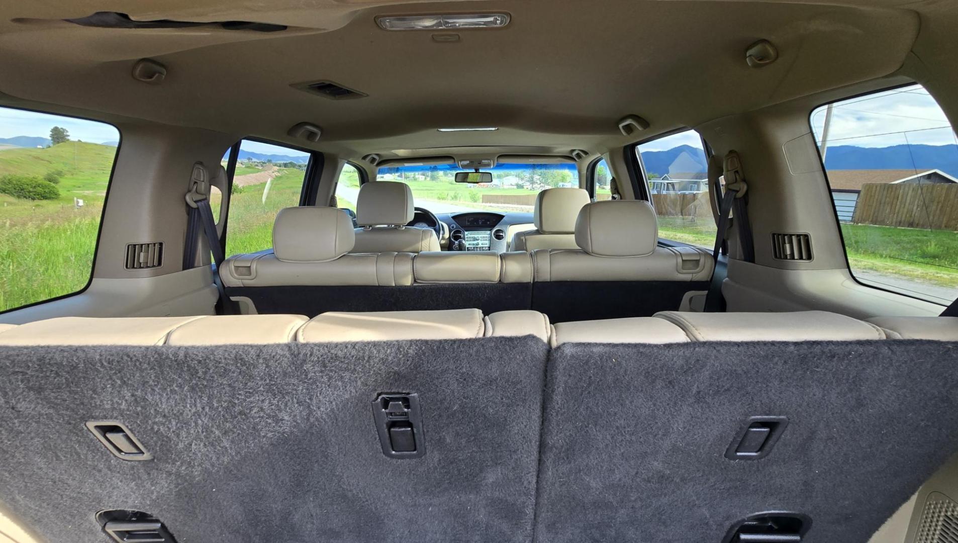2011 Gold /Tan Honda Pilot EX-L 4WD 5-Spd AT (5FNYF4H57BB) with an 3.5L V6 SOHC 24V engine, 5-Speed Automatic transmission, located at 450 N Russell, Missoula, MT, 59801, (406) 543-6600, 46.874496, -114.017433 - Another great running Honda AWD. Reliable 3.5L V6 Engine. Heated Front Seats, 3rd Row Seats. Sunroof. Front and Rear Climate Control. Air. Cruise. Tilt. Power Windows and Locks. AM FM CD Changer. Tow Hitch. Clean Title and Carfax. Come by for a test drive. You won't be disappointed. - Photo#8