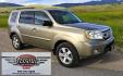 2011 Gold /Tan Honda Pilot EX-L 4WD 5-Spd AT (5FNYF4H57BB) with an 3.5L V6 SOHC 24V engine, 5-Speed Automatic transmission, located at 450 N Russell, Missoula, MT, 59801, (406) 543-6600, 46.874496, -114.017433 - Another great running Honda AWD. Reliable 3.5L V6 Engine. Heated Front Seats, 3rd Row Seats. Sunroof. Front and Rear Climate Control. Air. Cruise. Tilt. Power Windows and Locks. AM FM CD Changer. Tow Hitch. Clean Title and Carfax. Come by for a test drive. You won't be disappointed. - Photo#7