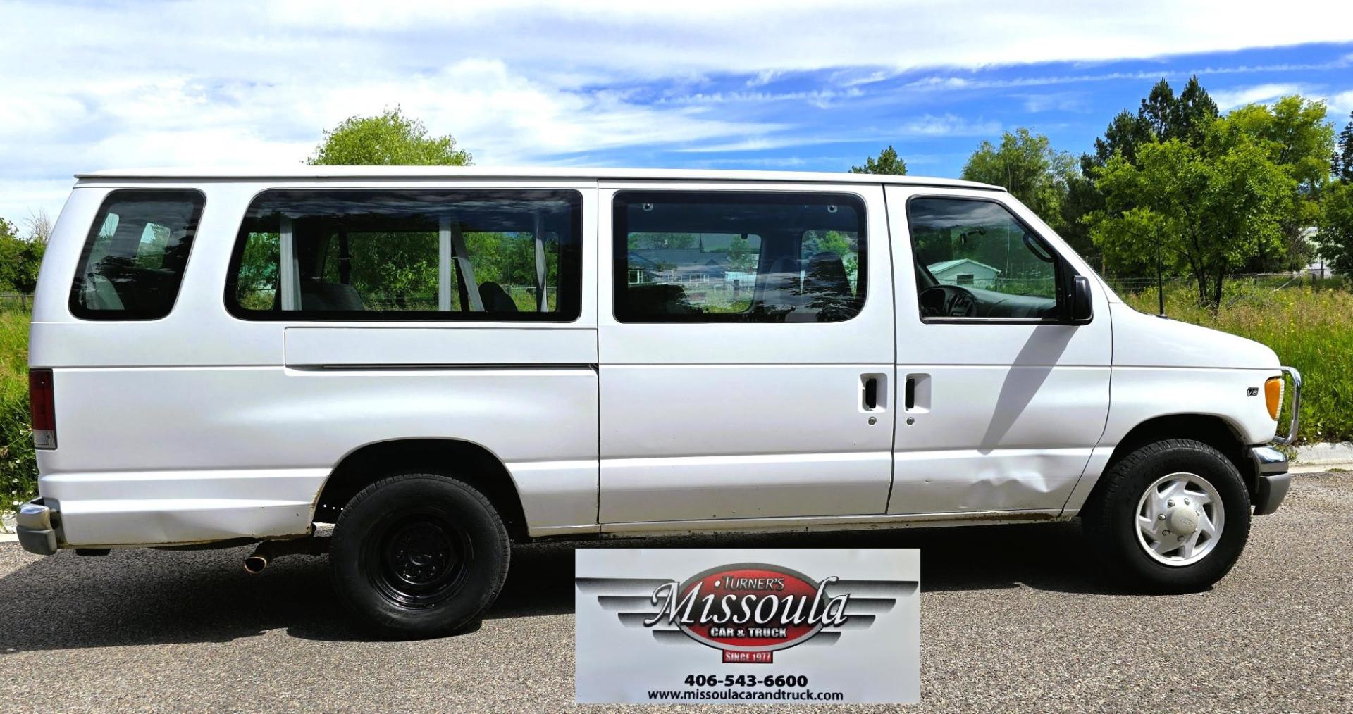 2001 White /Gray Ford Econoline E-350 Extended (1FBSS31L01H) with an 5.4L V8 SOHC 16V engine, 4-Speed Automatic Overdrive transmission, located at 450 N Russell, Missoula, MT, 59801, (406) 543-6600, 46.874496, -114.017433 - Extended Length One Ton Passenger Van that seats 14. 5.4L V8 Engine. Automatic Transmission. Rear Wheel Drive. Air Conditioning. Cruise Control. AM FM Cassette Player. Runs Great. Set up for towing. This vehicle was in a MINOR accident in 2021 and because the damage was more than the cost to repair - Photo#3