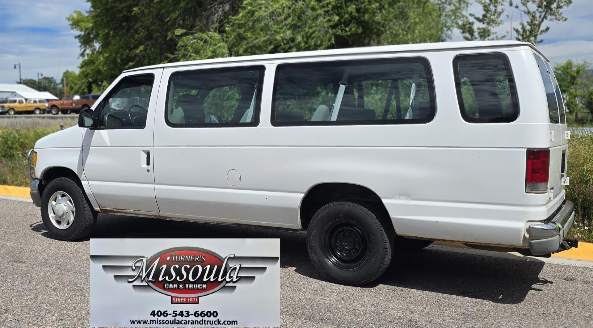 2001 White /Gray Ford Econoline E-350 Extended (1FBSS31L01H) with an 5.4L V8 SOHC 16V engine, 4-Speed Automatic Overdrive transmission, located at 450 N Russell, Missoula, MT, 59801, (406) 543-6600, 46.874496, -114.017433 - Extended Length One Ton Passenger Van that seats 14. 5.4L V8 Engine. Automatic Transmission. Rear Wheel Drive. Air Conditioning. Cruise Control. AM FM Cassette Player. Runs Great. Set up for towing. This vehicle was in a MINOR accident in 2021 and because the damage was more than the cost to repair - Photo#1
