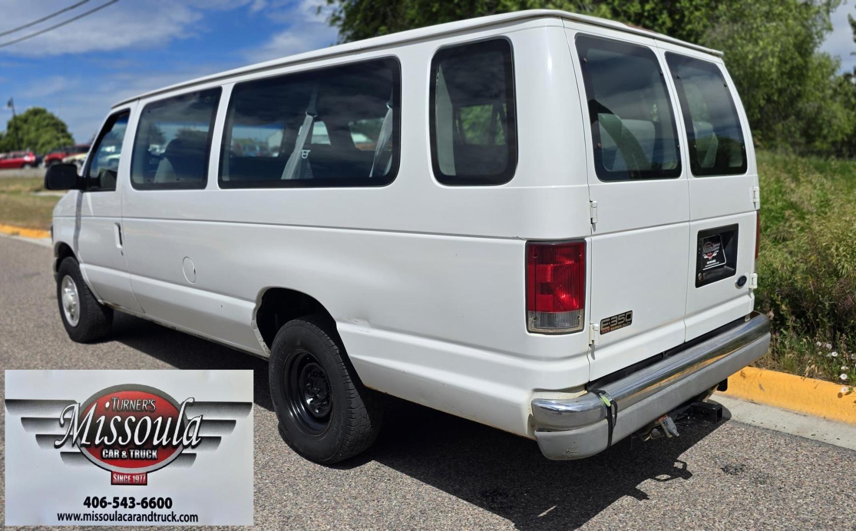 2001 White /Gray Ford Econoline E-350 Extended (1FBSS31L01H) with an 5.4L V8 SOHC 16V engine, 4-Speed Automatic Overdrive transmission, located at 450 N Russell, Missoula, MT, 59801, (406) 543-6600, 46.874496, -114.017433 - Extended Length One Ton Passenger Van that seats 14. 5.4L V8 Engine. Automatic Transmission. Rear Wheel Drive. Air Conditioning. Cruise Control. AM FM Cassette Player. Runs Great. Set up for towing. This vehicle was in a MINOR accident in 2021 and because the damage was more than the cost to repair - Photo#7