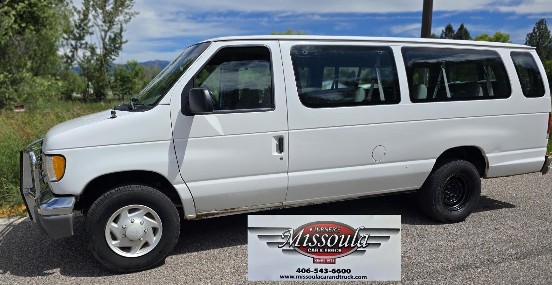 2001 White /Gray Ford Econoline E-350 Extended (1FBSS31L01H) with an 5.4L V8 SOHC 16V engine, 4-Speed Automatic Overdrive transmission, located at 450 N Russell, Missoula, MT, 59801, (406) 543-6600, 46.874496, -114.017433 - Extended Length One Ton Passenger Van that seats 14. 5.4L V8 Engine. Automatic Transmission. Rear Wheel Drive. Air Conditioning. Cruise Control. AM FM Cassette Player. Runs Great. Set up for towing. This vehicle was in a MINOR accident in 2021 and because the damage was more than the cost to repair - Photo#2