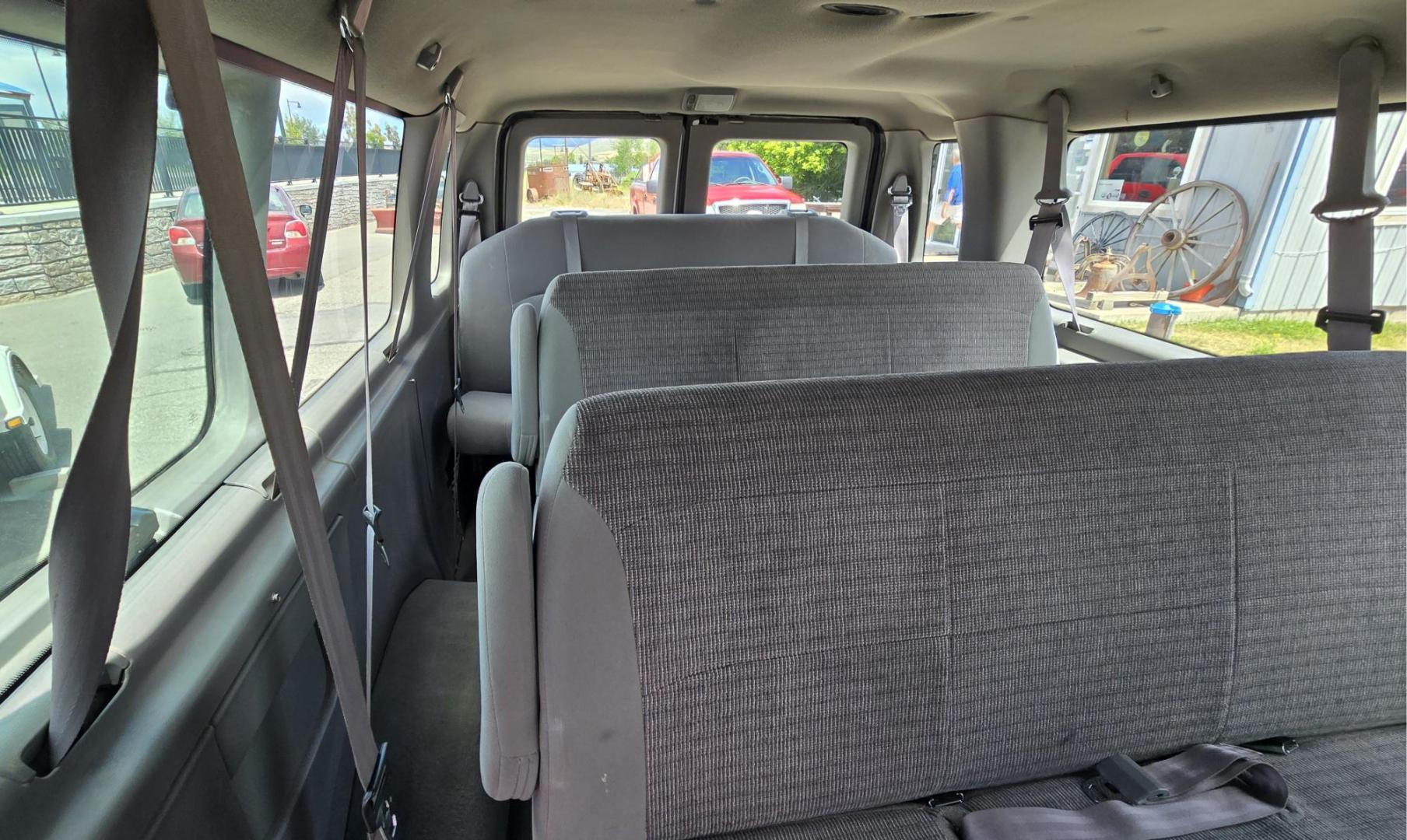 2001 White /Gray Ford Econoline E-350 Extended (1FBSS31L01H) with an 5.4L V8 SOHC 16V engine, 4-Speed Automatic Overdrive transmission, located at 450 N Russell, Missoula, MT, 59801, (406) 543-6600, 46.874496, -114.017433 - Extended Length One Ton Passenger Van that seats 14. 5.4L V8 Engine. Automatic Transmission. Rear Wheel Drive. Air Conditioning. Cruise Control. AM FM Cassette Player. Runs Great. Set up for towing. This vehicle was in a MINOR accident in 2021 and because the damage was more than the cost to repair - Photo#11