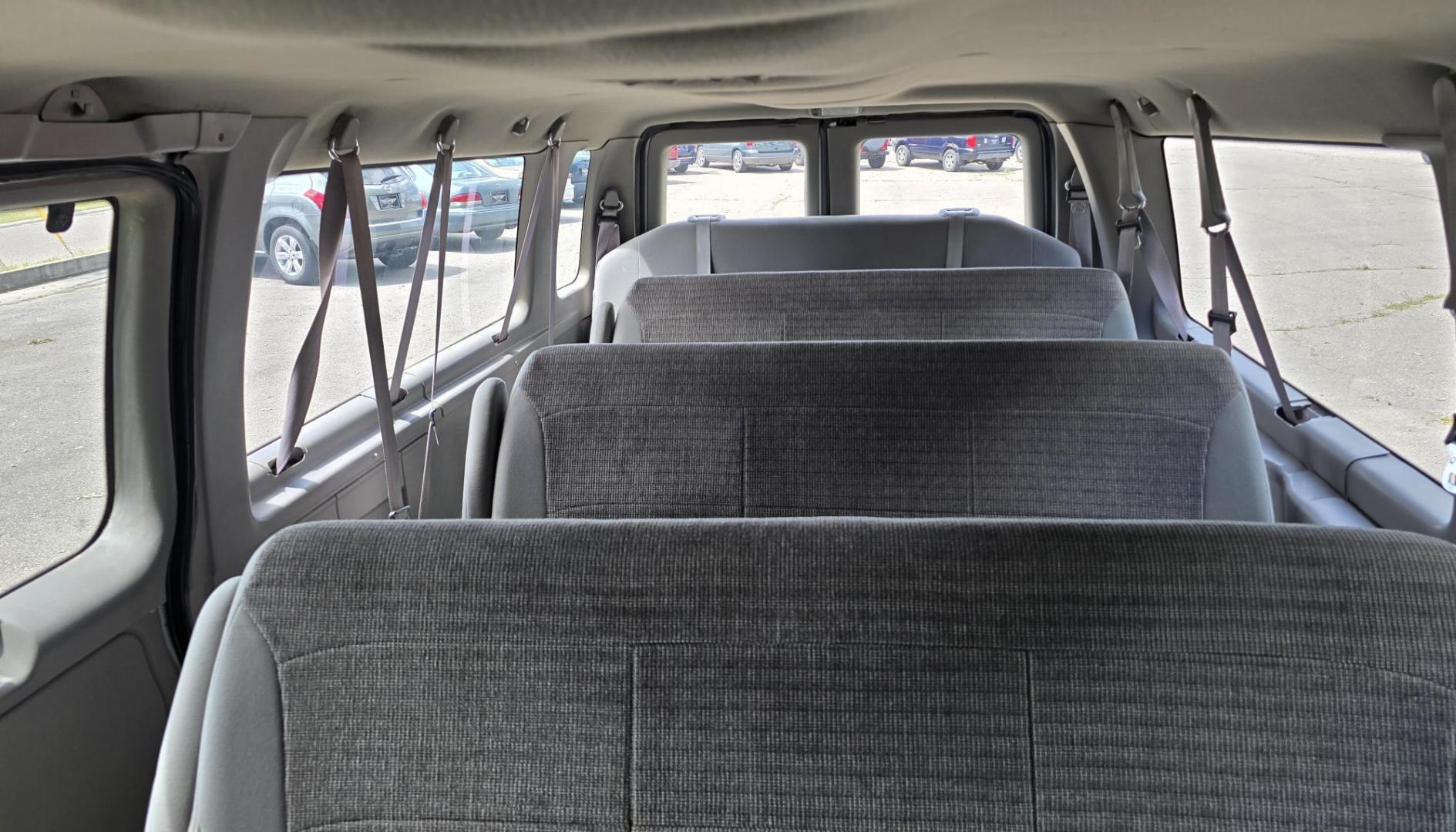 2001 White /Gray Ford Econoline E-350 Extended (1FBSS31L01H) with an 5.4L V8 SOHC 16V engine, 4-Speed Automatic Overdrive transmission, located at 450 N Russell, Missoula, MT, 59801, (406) 543-6600, 46.874496, -114.017433 - Extended Length One Ton Passenger Van that seats 14. 5.4L V8 Engine. Automatic Transmission. Rear Wheel Drive. Air Conditioning. Cruise Control. AM FM Cassette Player. Runs Great. Set up for towing. This vehicle was in a MINOR accident in 2021 and because the damage was more than the cost to repair - Photo#13