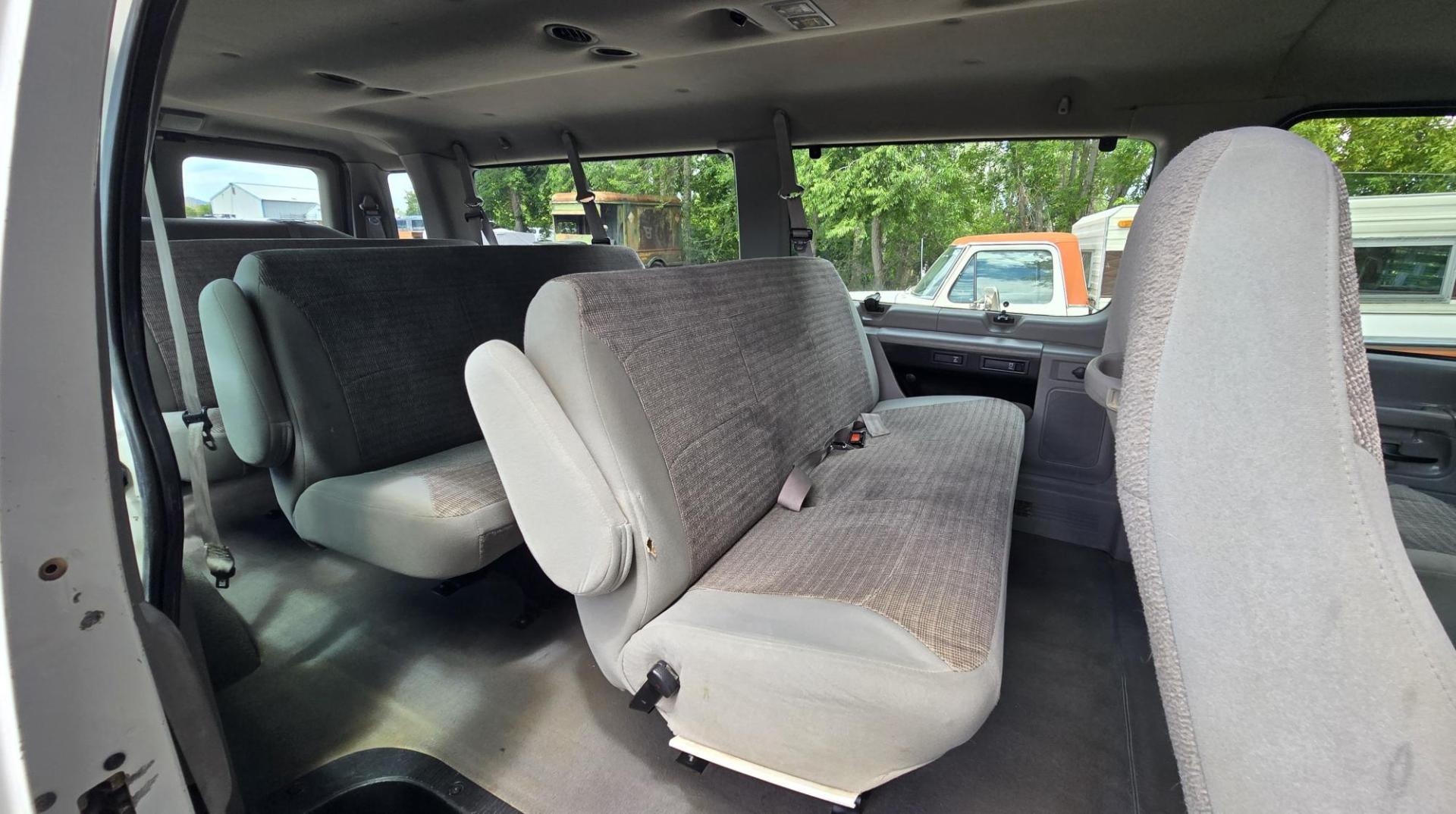2001 White /Gray Ford Econoline E-350 Extended (1FBSS31L01H) with an 5.4L V8 SOHC 16V engine, 4-Speed Automatic Overdrive transmission, located at 450 N Russell, Missoula, MT, 59801, (406) 543-6600, 46.874496, -114.017433 - Extended Length One Ton Passenger Van that seats 14. 5.4L V8 Engine. Automatic Transmission. Rear Wheel Drive. Air Conditioning. Cruise Control. AM FM Cassette Player. Runs Great. Set up for towing. This vehicle was in a MINOR accident in 2021 and because the damage was more than the cost to repair - Photo#16