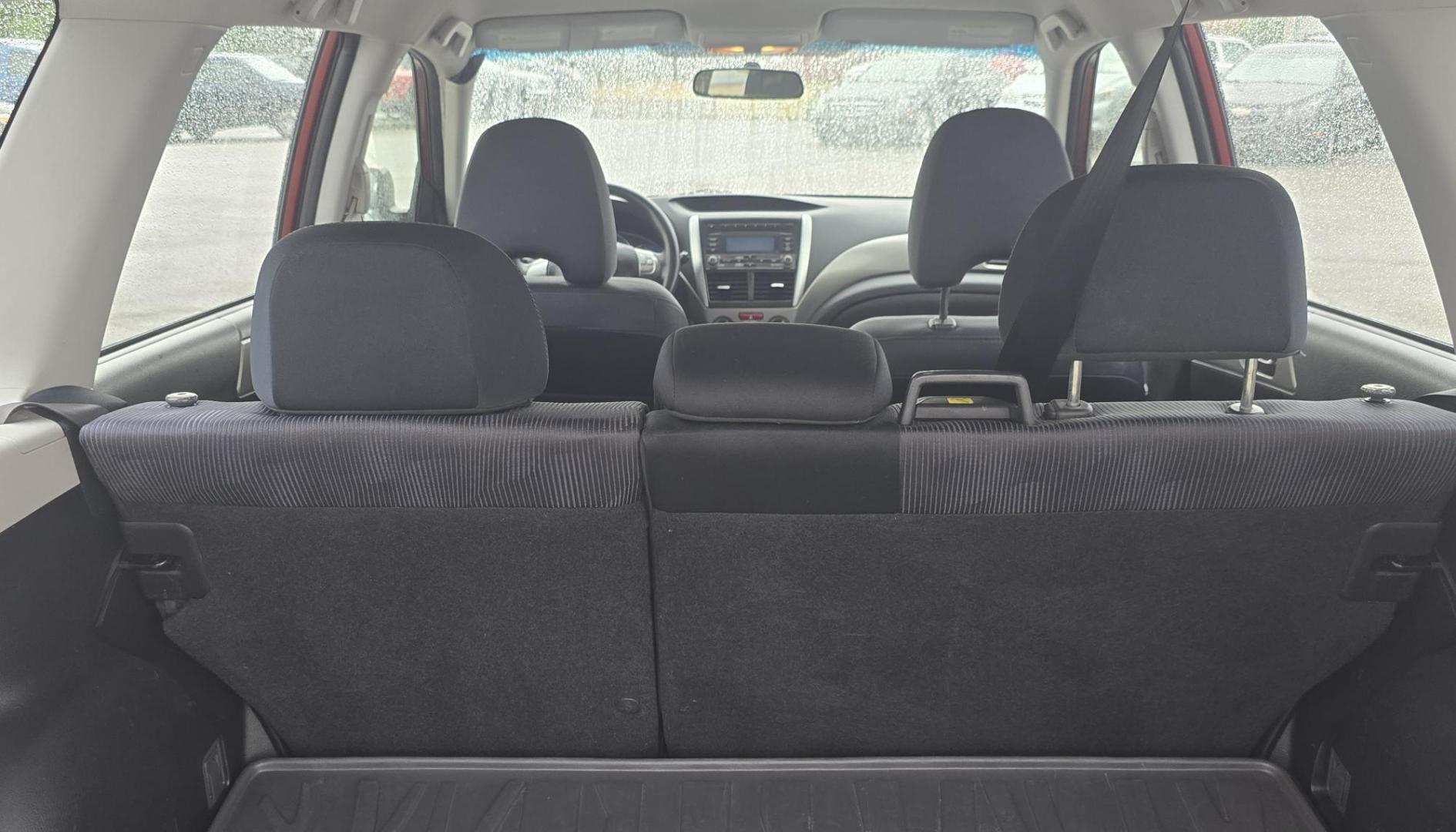 2009 Red /Black Subaru Forester 2.5X (JF2SH61609H) with an 2.5L H4 SOHC 16V engine, 4-Speed Automatic Overdrive transmission, located at 450 N Russell, Missoula, MT, 59801, (406) 543-6600, 46.874496, -114.017433 - Two Owner, Go Almost Anywhere AWD Subaru Forester. 2.5L H4 Engine. Automatic Transmission. Air Conditioning. Power Windows and Locks. Cruise Control. Tilt Steering. AM FM CD Player. Clean Title and Carfax. Head Gaskets were replaced at 92K Miles. We Finance through local Credit Unions. We do NOT - Photo#9