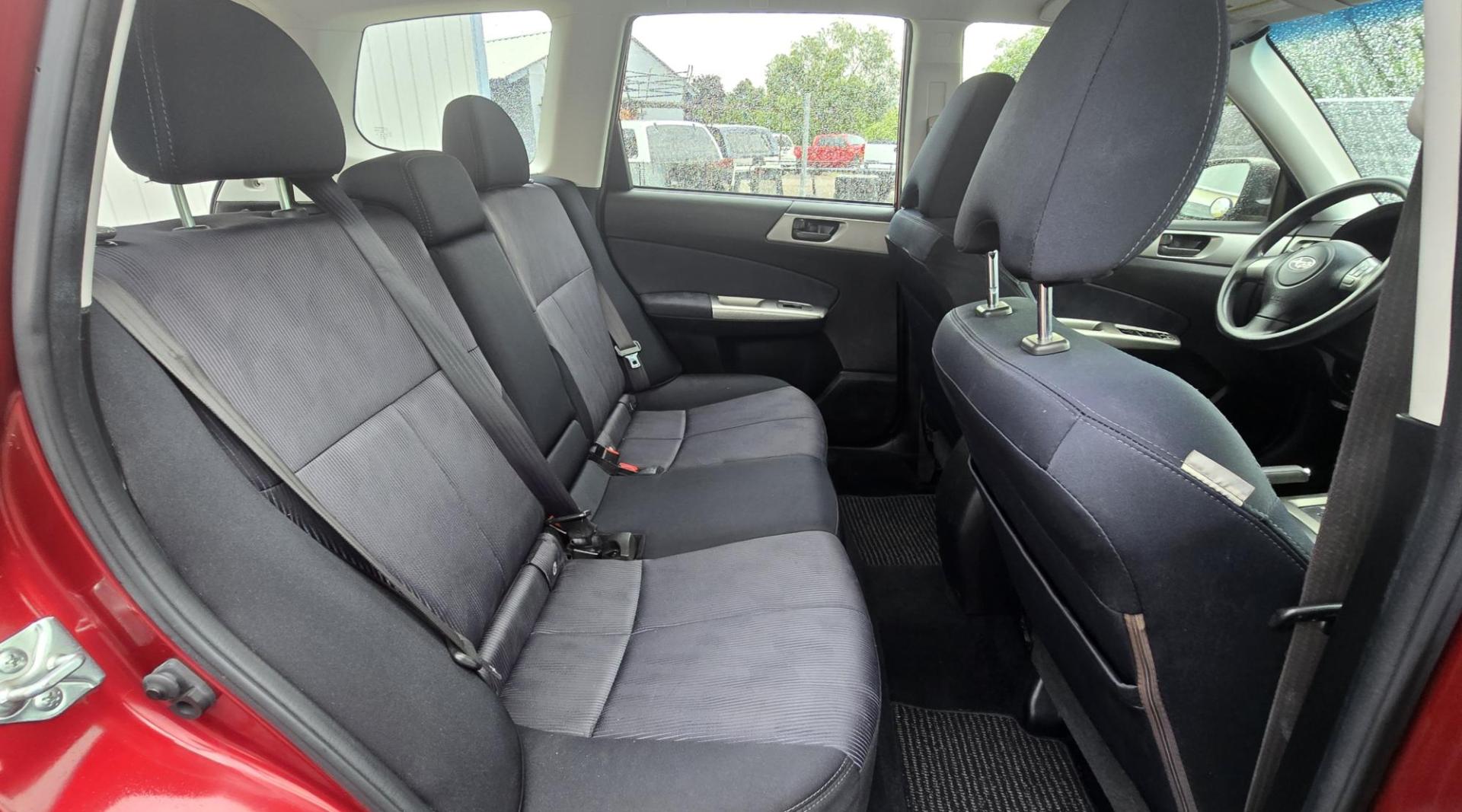 2009 Red /Black Subaru Forester 2.5X (JF2SH61609H) with an 2.5L H4 SOHC 16V engine, 4-Speed Automatic Overdrive transmission, located at 450 N Russell, Missoula, MT, 59801, (406) 543-6600, 46.874496, -114.017433 - Two Owner, Go Almost Anywhere AWD Subaru Forester. 2.5L H4 Engine. Automatic Transmission. Air Conditioning. Power Windows and Locks. Cruise Control. Tilt Steering. AM FM CD Player. Clean Title and Carfax. Head Gaskets were replaced at 92K Miles. We Finance through local Credit Unions. We do NOT - Photo#10