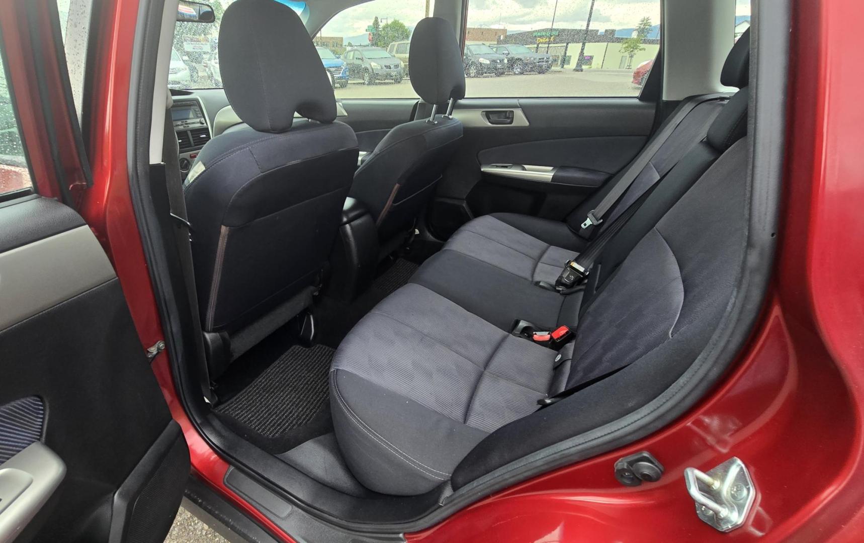 2009 Red /Black Subaru Forester 2.5X (JF2SH61609H) with an 2.5L H4 SOHC 16V engine, 4-Speed Automatic Overdrive transmission, located at 450 N Russell, Missoula, MT, 59801, (406) 543-6600, 46.874496, -114.017433 - Two Owner, Go Almost Anywhere AWD Subaru Forester. 2.5L H4 Engine. Automatic Transmission. Air Conditioning. Power Windows and Locks. Cruise Control. Tilt Steering. AM FM CD Player. Clean Title and Carfax. Head Gaskets were replaced at 92K Miles. We Finance through local Credit Unions. We do NOT - Photo#12