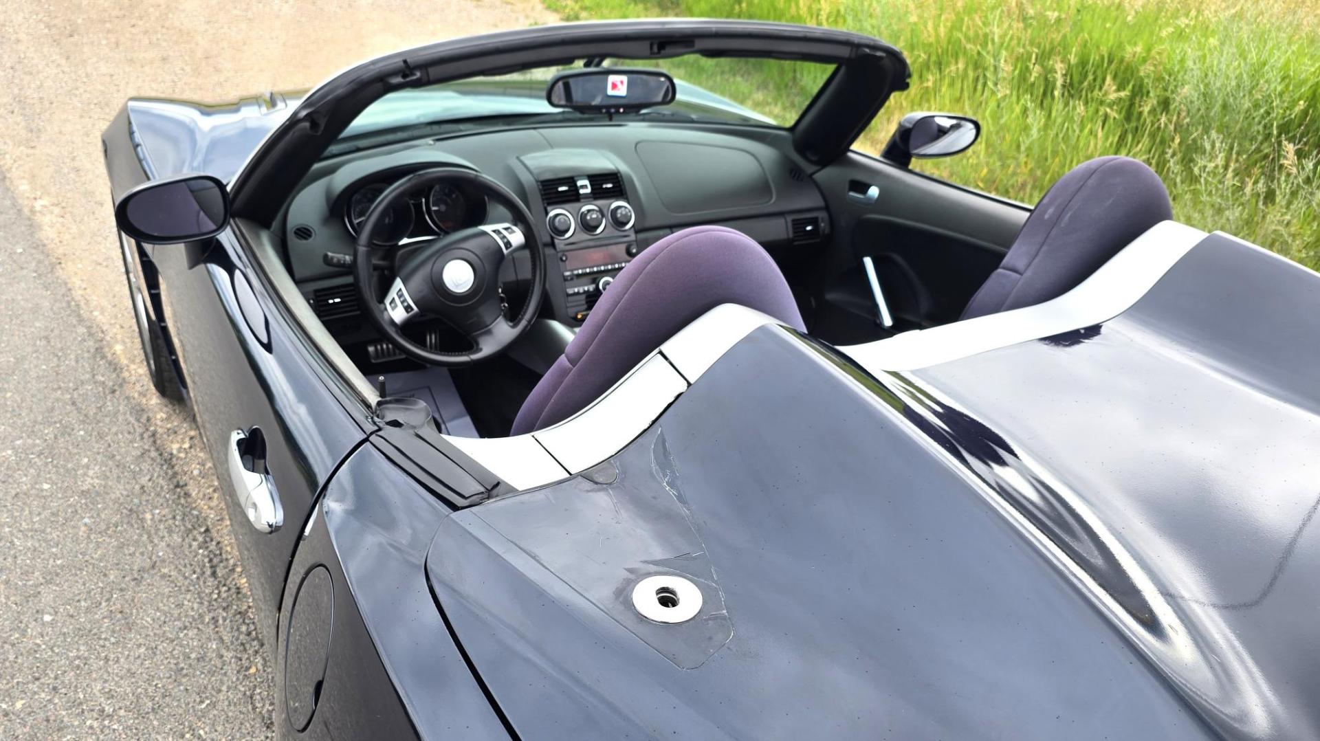 2007 Blue /Black Saturn Sky Convertible (1G8MB35B07Y) with an 2.4L L4 DOHC 16V engine, Automatic transmission, located at 450 N Russell, Missoula, MT, 59801, (406) 543-6600, 46.874496, -114.017433 - Photo#4
