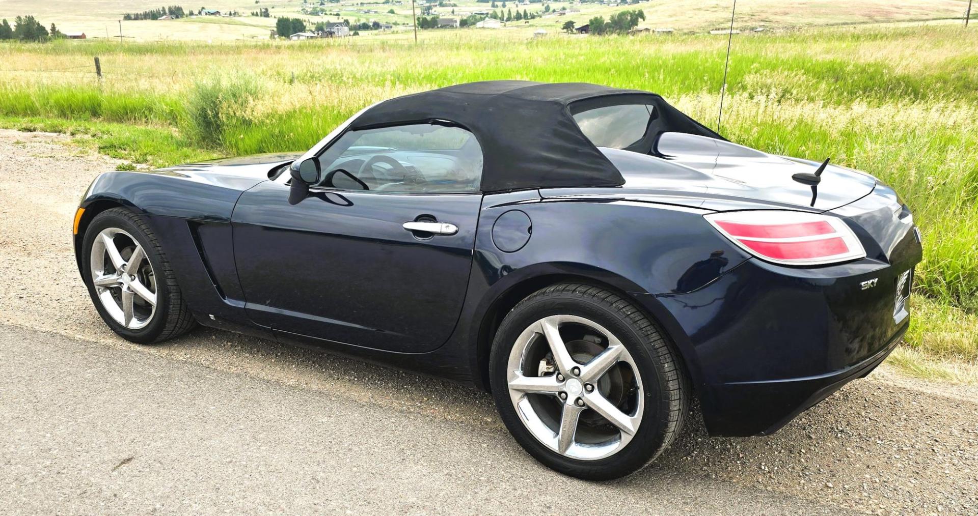 2007 Blue /Black Saturn Sky Convertible (1G8MB35B07Y) with an 2.4L L4 DOHC 16V engine, Automatic transmission, located at 450 N Russell, Missoula, MT, 59801, (406) 543-6600, 46.874496, -114.017433 - Photo#7