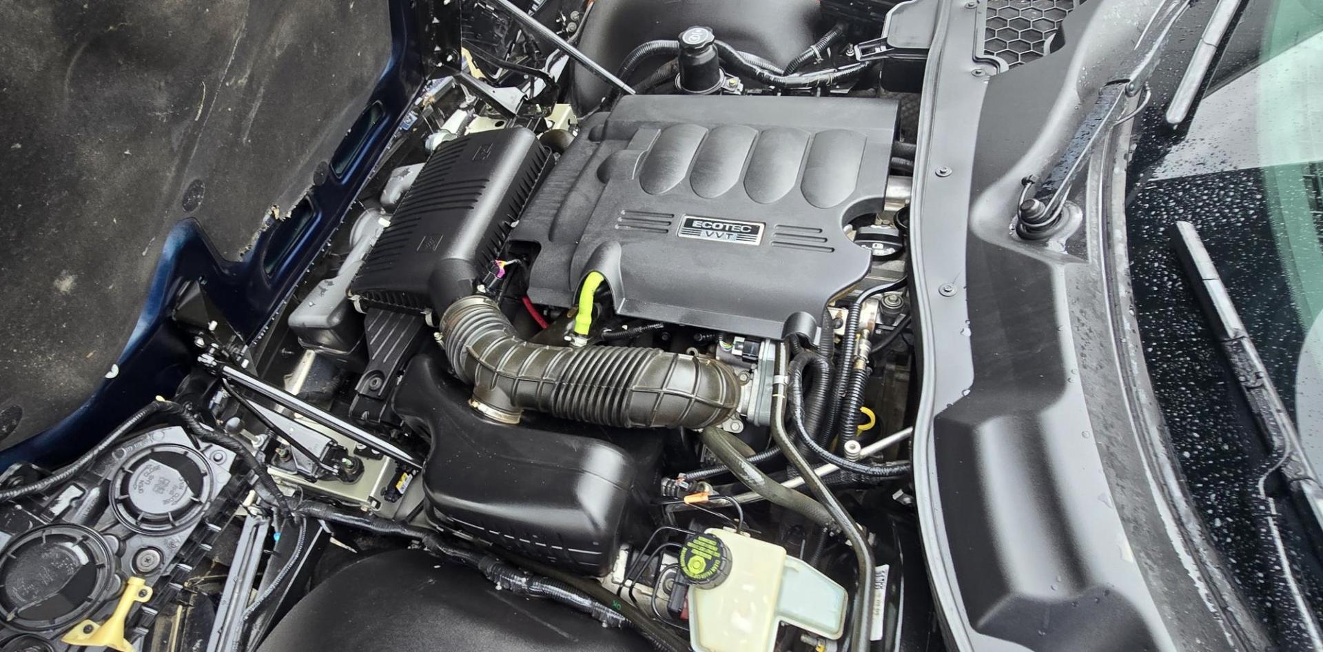 2007 Blue /Black Saturn Sky Convertible (1G8MB35B07Y) with an 2.4L L4 DOHC 16V engine, Automatic transmission, located at 450 N Russell, Missoula, MT, 59801, (406) 543-6600, 46.874496, -114.017433 - Photo#20
