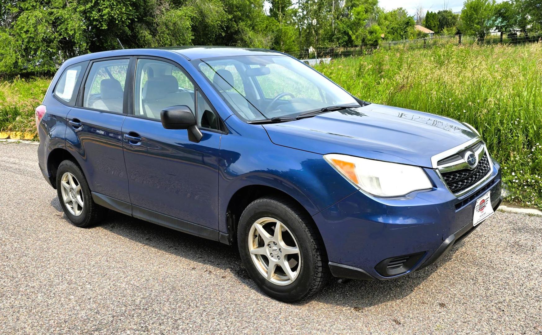 2014 Blue /White Subaru Forester 2.5i (JF2SJAAC6EH) with an 2.5L H4 SOHC 16V engine, 6-Speed Automatic transmission, located at 450 N Russell, Missoula, MT, 59801, (406) 543-6600, 46.874496, -114.017433 - Patriotic Blue 2 Owner Subaru with a clean Title and Carfax. 2.5L I4 Engine. Automatic Transmission. Air Conditioning. Cruise Control. Power Windows and Locks. AM FM CD Player. Bluetooth Audio and Phone Connection. Tires are in Very Good Condition. We Finance through local Credit Unions. We do N- Photo#6