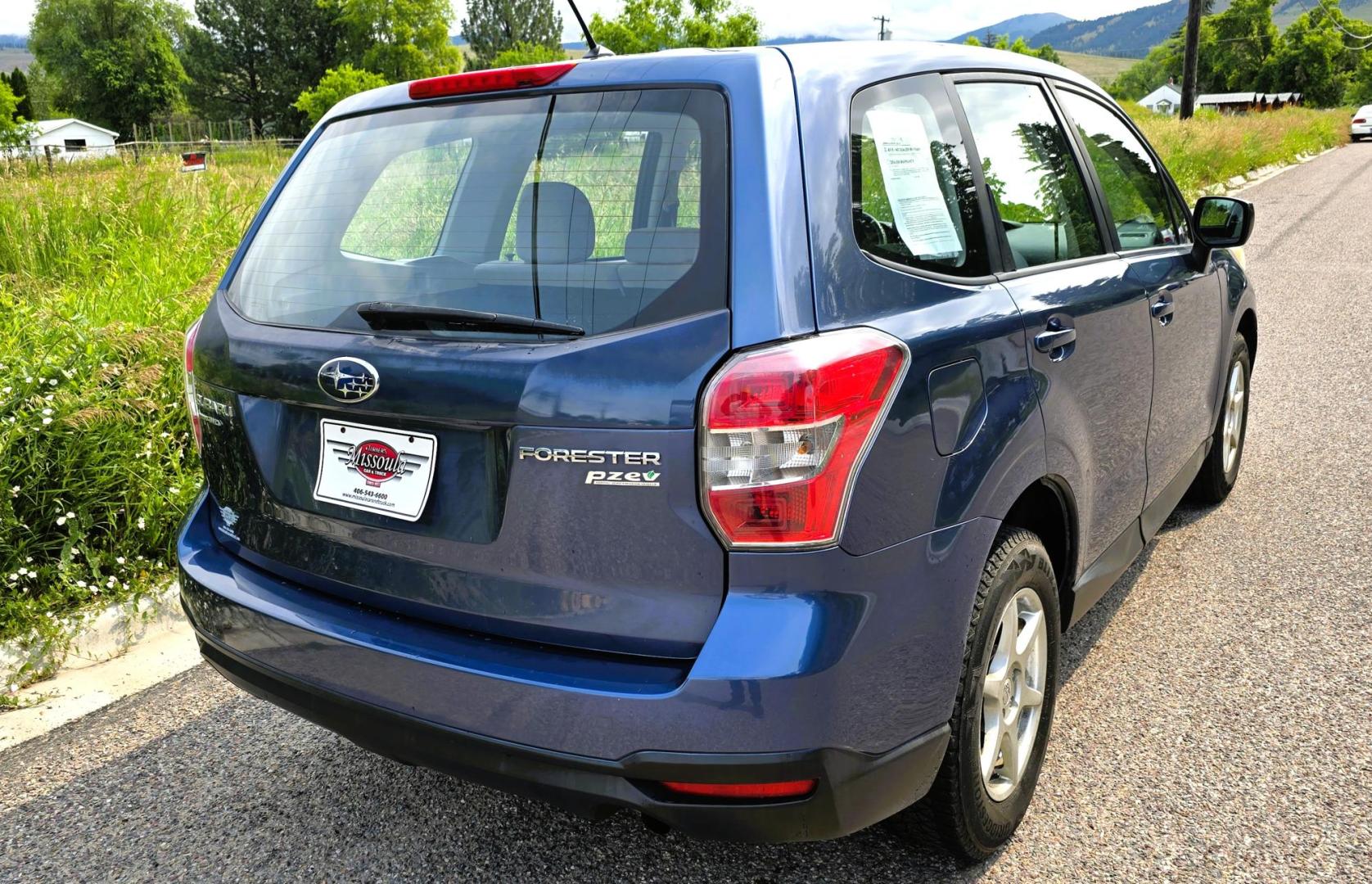 2014 Blue /White Subaru Forester 2.5i (JF2SJAAC6EH) with an 2.5L H4 SOHC 16V engine, 6-Speed Automatic transmission, located at 450 N Russell, Missoula, MT, 59801, (406) 543-6600, 46.874496, -114.017433 - Patriotic Blue 2 Owner Subaru with a clean Title and Carfax. 2.5L I4 Engine. Automatic Transmission. Air Conditioning. Cruise Control. Power Windows and Locks. AM FM CD Player. Bluetooth Audio and Phone Connection. Tires are in Very Good Condition. We Finance through local Credit Unions. We do N- Photo#8