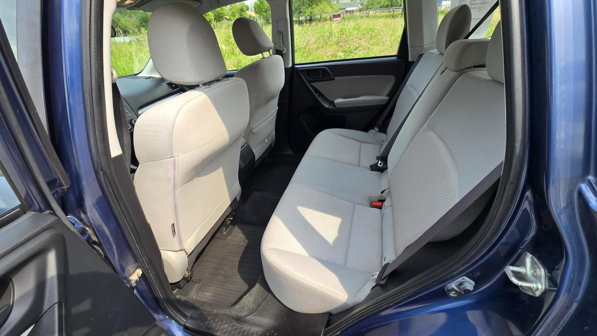 2014 Blue /White Subaru Forester 2.5i (JF2SJAAC6EH) with an 2.5L H4 SOHC 16V engine, 6-Speed Automatic transmission, located at 450 N Russell, Missoula, MT, 59801, (406) 543-6600, 46.874496, -114.017433 - Patriotic Blue 2 Owner Subaru with a clean Title and Carfax. 2.5L I4 Engine. Automatic Transmission. Air Conditioning. Cruise Control. Power Windows and Locks. AM FM CD Player. Bluetooth Audio and Phone Connection. Tires are in Very Good Condition. We Finance through local Credit Unions. We do N- Photo#16