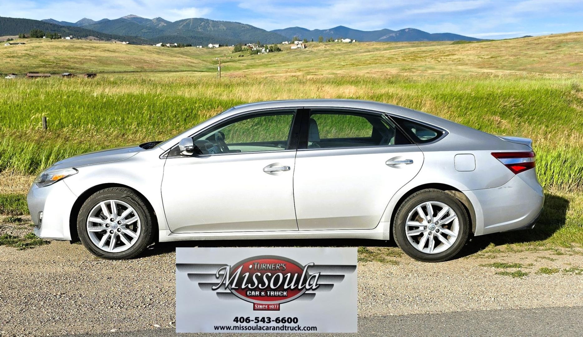 2014 Silver /White Toyota Avalon XLE (4T1BK1EB2EU) with an 3.5L V6 engine, Automatic transmission, located at 450 N Russell, Missoula, MT, 59801, (406) 543-6600, 46.874496, -114.017433 - Another Great Running Toyota. 3.5L V6 Engine. Front Wheel Drive. Power Heated Front Seats. Air Conditioning. Cruise. Control. Tilt Steering. AM FM CD Player. Bluetooth Audio and Phone Connection. Backup Camera. Clean Title and Carfax. If your looking for a reliable commuter car. Look no further.- Photo#0