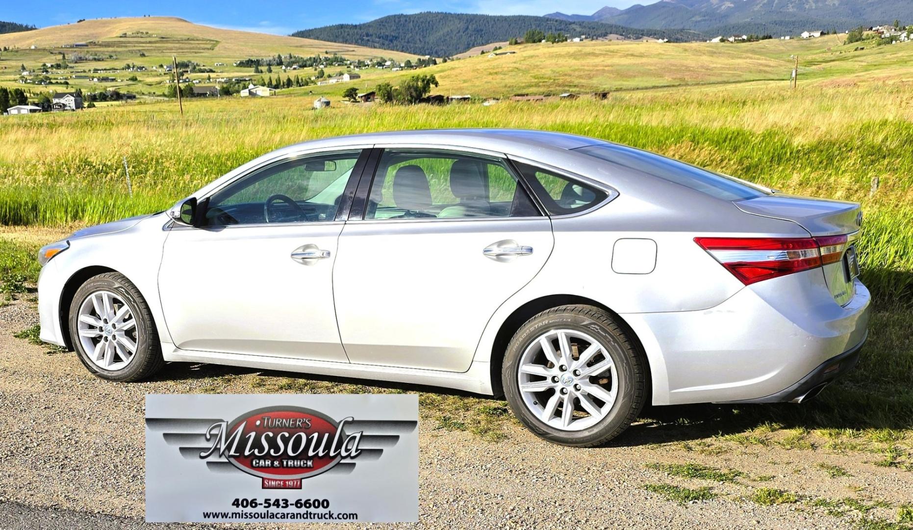 2014 Silver /White Toyota Avalon XLE (4T1BK1EB2EU) with an 3.5L V6 engine, Automatic transmission, located at 450 N Russell, Missoula, MT, 59801, (406) 543-6600, 46.874496, -114.017433 - Another Great Running Toyota. 3.5L V6 Engine. Front Wheel Drive. Power Heated Front Seats. Air Conditioning. Cruise. Control. Tilt Steering. AM FM CD Player. Bluetooth Audio and Phone Connection. Backup Camera. Clean Title and Carfax. If your looking for a reliable commuter car. Look no further.- Photo#1