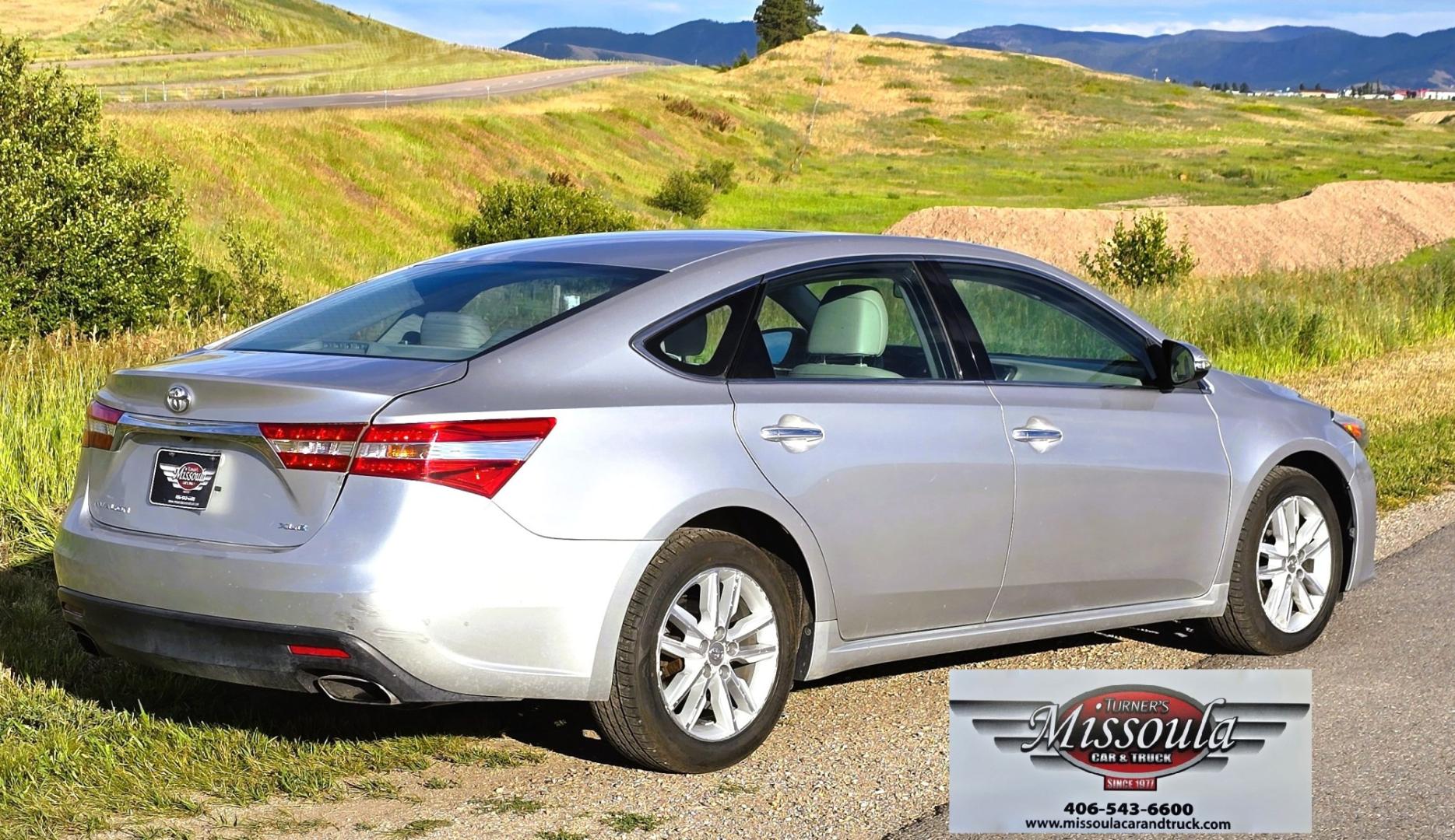 2014 Silver /White Toyota Avalon XLE (4T1BK1EB2EU) with an 3.5L V6 engine, Automatic transmission, located at 450 N Russell, Missoula, MT, 59801, (406) 543-6600, 46.874496, -114.017433 - Another Great Running Toyota. 3.5L V6 Engine. Front Wheel Drive. Power Heated Front Seats. Air Conditioning. Cruise. Control. Tilt Steering. AM FM CD Player. Bluetooth Audio and Phone Connection. Backup Camera. Clean Title and Carfax. If your looking for a reliable commuter car. Look no further.- Photo#4