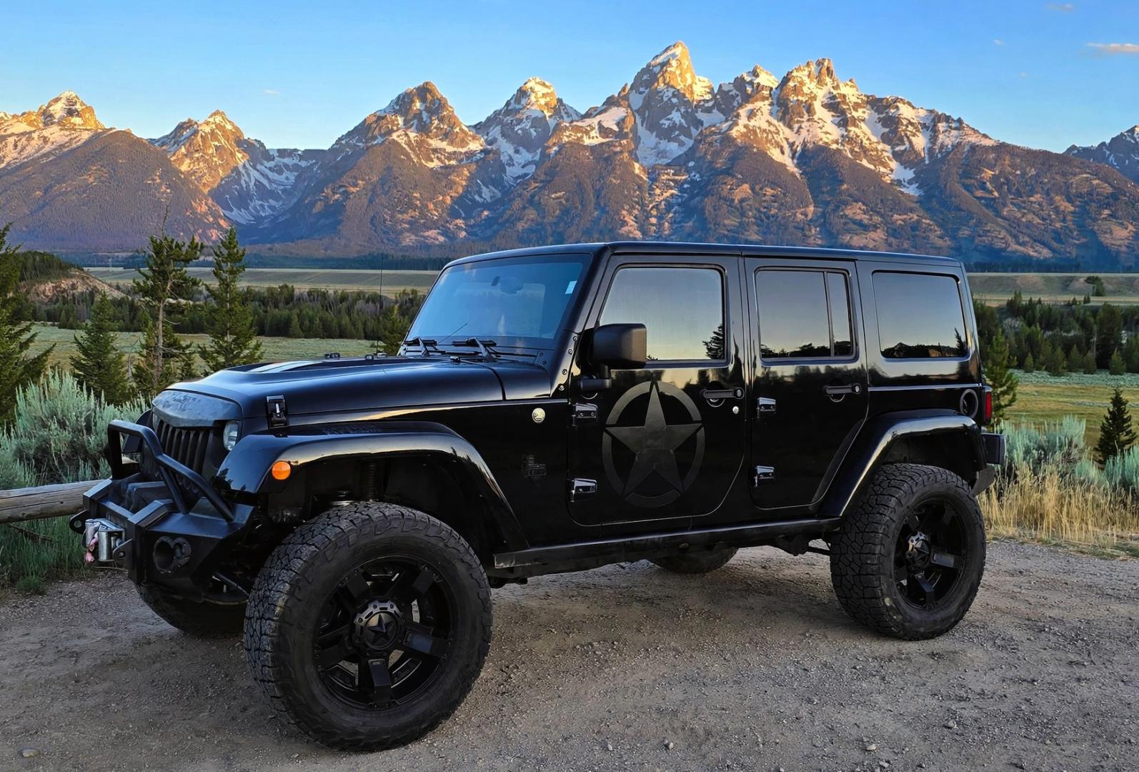 2013 Black /Black Jeep Wrangler Unlimited Rubicon 4WD (1C4HJWFG2DL) with an 3.6L V6 DOHC 24V FFV engine, Automatic transmission, located at 450 N Russell, Missoula, MT, 59801, (406) 543-6600, 46.874496, -114.017433 - Ready for Off-Road or a Classy Date on the town. 2013 Jeep Rubicon 4WD. 4 Door with a Hardtop. 3.6L V6 Engine. Automatic Transmission. Heated Front Seats. Nice Aftermarket Wheels. 8K Lb Winch in on Heavy Duty Front Bumper. Air Conditioning. Touch Screen Stereo with Bluetooth Phone. Power Windows and- Photo#0
