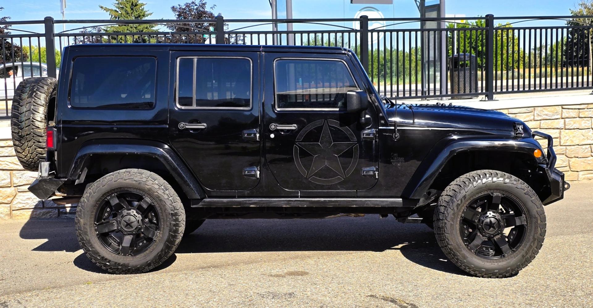 2013 Black /Black Jeep Wrangler Unlimited Rubicon 4WD (1C4HJWFG2DL) with an 3.6L V6 DOHC 24V FFV engine, Automatic transmission, located at 450 N Russell, Missoula, MT, 59801, (406) 543-6600, 46.874496, -114.017433 - Ready for Off-Road or a Classy Date on the town. 2013 Jeep Rubicon 4WD. 4 Door with a Hardtop. 3.6L V6 Engine. Automatic Transmission. Heated Front Seats. Nice Aftermarket Wheels. 8K Lb Winch in on Heavy Duty Front Bumper. Air Conditioning. Touch Screen Stereo with Bluetooth Phone. Power Windows and- Photo#2