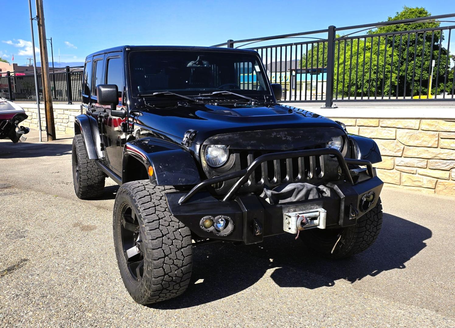 2013 Black /Black Jeep Wrangler Unlimited Rubicon 4WD (1C4HJWFG2DL) with an 3.6L V6 DOHC 24V FFV engine, Automatic transmission, located at 450 N Russell, Missoula, MT, 59801, (406) 543-6600, 46.874496, -114.017433 - Ready for Off-Road or a Classy Date on the town. 2013 Jeep Rubicon 4WD. 4 Door with a Hardtop. 3.6L V6 Engine. Automatic Transmission. Heated Front Seats. Nice Aftermarket Wheels. 8K Lb Winch in on Heavy Duty Front Bumper. Air Conditioning. Touch Screen Stereo with Bluetooth Phone. Power Windows and- Photo#5
