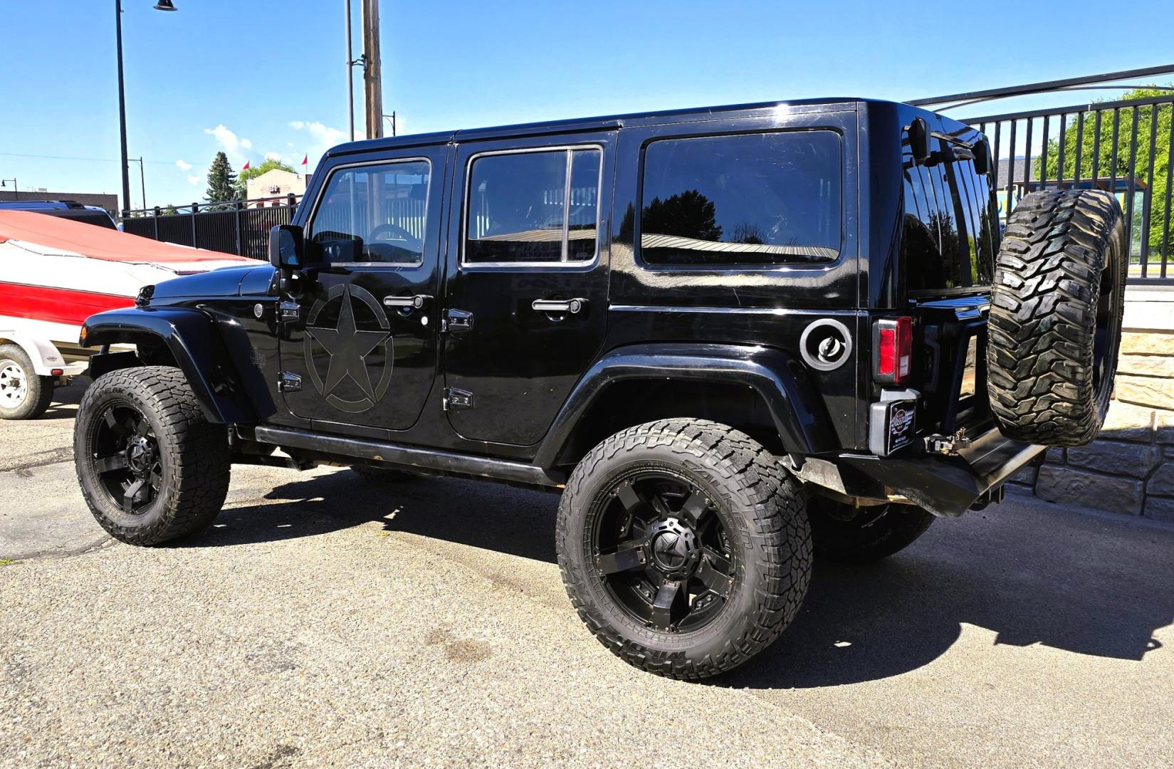2013 Black /Black Jeep Wrangler Unlimited Rubicon 4WD (1C4HJWFG2DL) with an 3.6L V6 DOHC 24V FFV engine, Automatic transmission, located at 450 N Russell, Missoula, MT, 59801, (406) 543-6600, 46.874496, -114.017433 - Ready for Off-Road or a Classy Date on the town. 2013 Jeep Rubicon 4WD. 4 Door with a Hardtop. 3.6L V6 Engine. Automatic Transmission. Heated Front Seats. Nice Aftermarket Wheels. 8K Lb Winch in on Heavy Duty Front Bumper. Air Conditioning. Touch Screen Stereo with Bluetooth Phone. Power Windows and- Photo#9