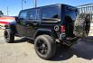 2013 Black /Black Jeep Wrangler Unlimited Rubicon 4WD (1C4HJWFG2DL) with an 3.6L V6 DOHC 24V FFV engine, Automatic transmission, located at 450 N Russell, Missoula, MT, 59801, (406) 543-6600, 46.874496, -114.017433 - Ready for Off-Road or a Classy Date on the town. 2013 Jeep Rubicon 4WD. 4 Door with a Hardtop. 3.6L V6 Engine. Automatic Transmission. Heated Front Seats. Nice Aftermarket Wheels. 8K Lb Winch in on Heavy Duty Front Bumper. Air Conditioning. Touch Screen Stereo with Bluetooth Phone. Power Windows and- Photo#8