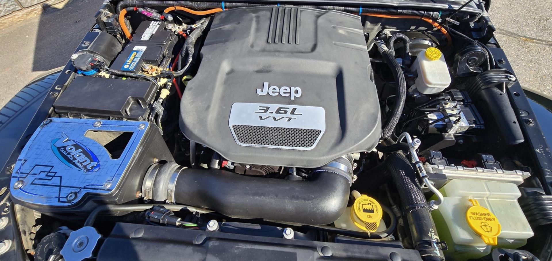 2013 Black /Black Jeep Wrangler Unlimited Rubicon 4WD (1C4HJWFG2DL) with an 3.6L V6 DOHC 24V FFV engine, Automatic transmission, located at 450 N Russell, Missoula, MT, 59801, (406) 543-6600, 46.874496, -114.017433 - Ready for Off-Road or a Classy Date on the town. 2013 Jeep Rubicon 4WD. 4 Door with a Hardtop. 3.6L V6 Engine. Automatic Transmission. Heated Front Seats. Nice Aftermarket Wheels. 8K Lb Winch in on Heavy Duty Front Bumper. Air Conditioning. Touch Screen Stereo with Bluetooth Phone. Power Windows and- Photo#21