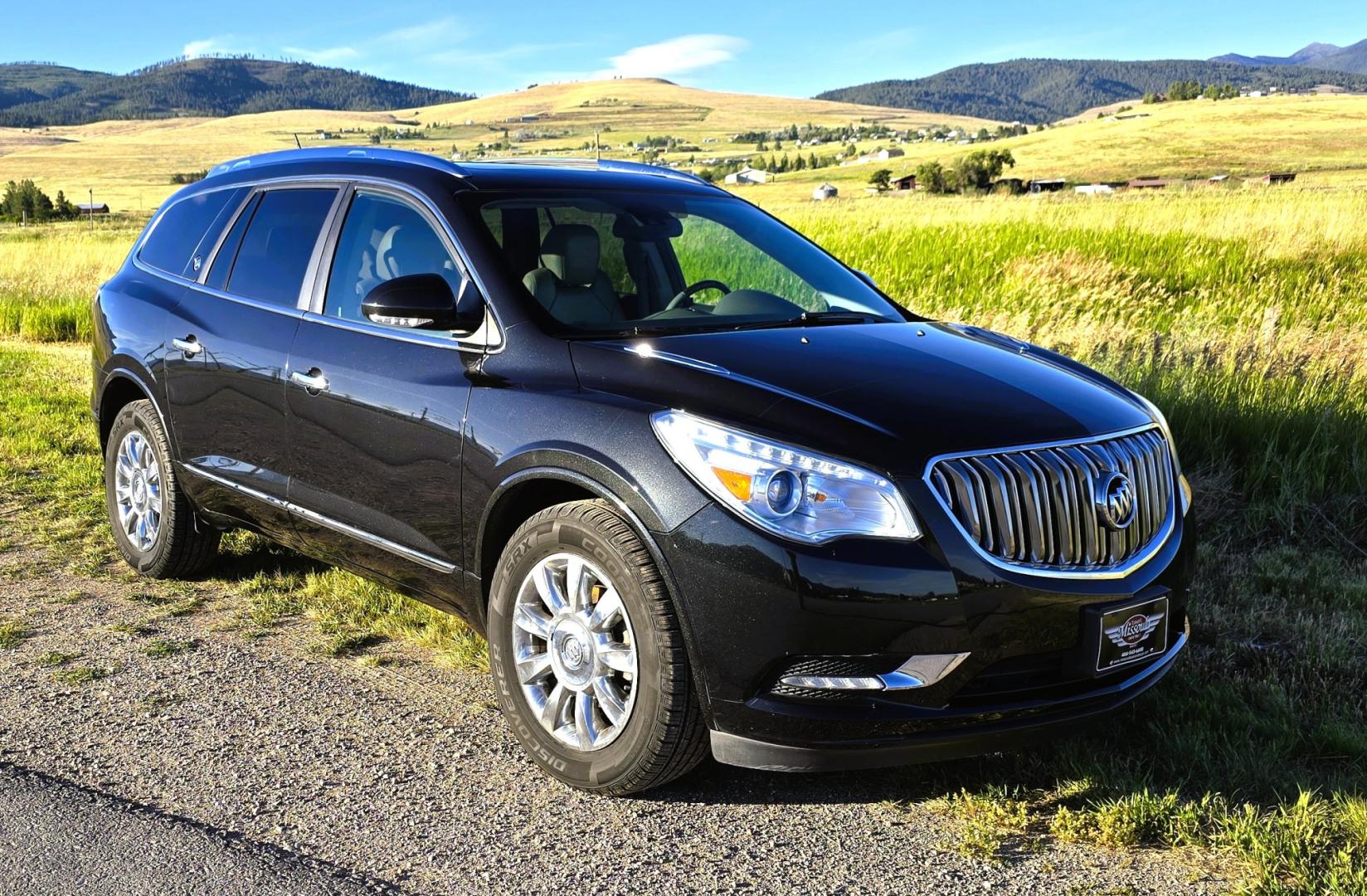 2014 Grey /Gray Buick Enclave Premium AWD (5GAKVCKD4EJ) with an 3.6L V6 DOHC 24V engine, 6-Speed Automatic Overdrive transmission, located at 450 N Russell, Missoula, MT, 59801, (406) 543-6600, 46.874496, -114.017433 - Gorgeous Dark Metallic Gray AWD Buick Enclave. Might be the nicest car on our lot. Reliable 3.6L V6 Engine. 6 Speed Automatic Overdrive Transmission. Panoramic Sunroof. Navigation. 3rd Row Seats. Middle Bucket Seats. Front Seats are Heated and Cooled. Navigation. AM FM XM CD Player, Bluetooth Audio- Photo#6