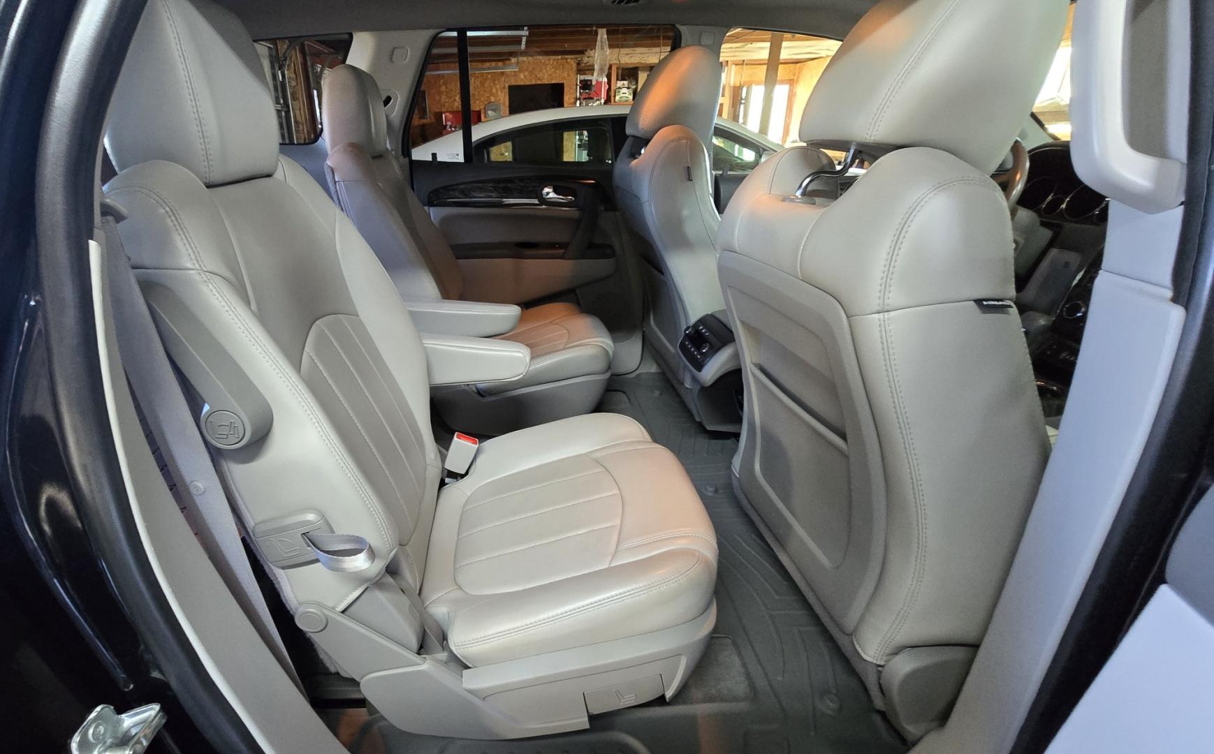 2014 Grey /Gray Buick Enclave Premium AWD (5GAKVCKD4EJ) with an 3.6L V6 DOHC 24V engine, 6-Speed Automatic Overdrive transmission, located at 450 N Russell, Missoula, MT, 59801, (406) 543-6600, 46.874496, -114.017433 - Gorgeous Dark Metallic Gray AWD Buick Enclave. Might be the nicest car on our lot. Reliable 3.6L V6 Engine. 6 Speed Automatic Overdrive Transmission. Panoramic Sunroof. Navigation. 3rd Row Seats. Middle Bucket Seats. Front Seats are Heated and Cooled. Navigation. AM FM XM CD Player, Bluetooth Audio- Photo#7