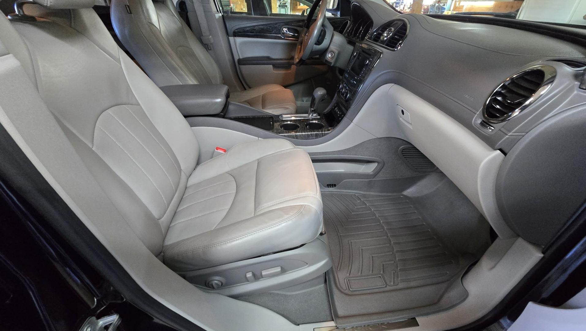 2014 Grey /Gray Buick Enclave Premium AWD (5GAKVCKD4EJ) with an 3.6L V6 DOHC 24V engine, 6-Speed Automatic Overdrive transmission, located at 450 N Russell, Missoula, MT, 59801, (406) 543-6600, 46.874496, -114.017433 - Gorgeous Dark Metallic Gray AWD Buick Enclave. Might be the nicest car on our lot. Reliable 3.6L V6 Engine. 6 Speed Automatic Overdrive Transmission. Panoramic Sunroof. Navigation. 3rd Row Seats. Middle Bucket Seats. Front Seats are Heated and Cooled. Navigation. AM FM XM CD Player, Bluetooth Audio- Photo#10