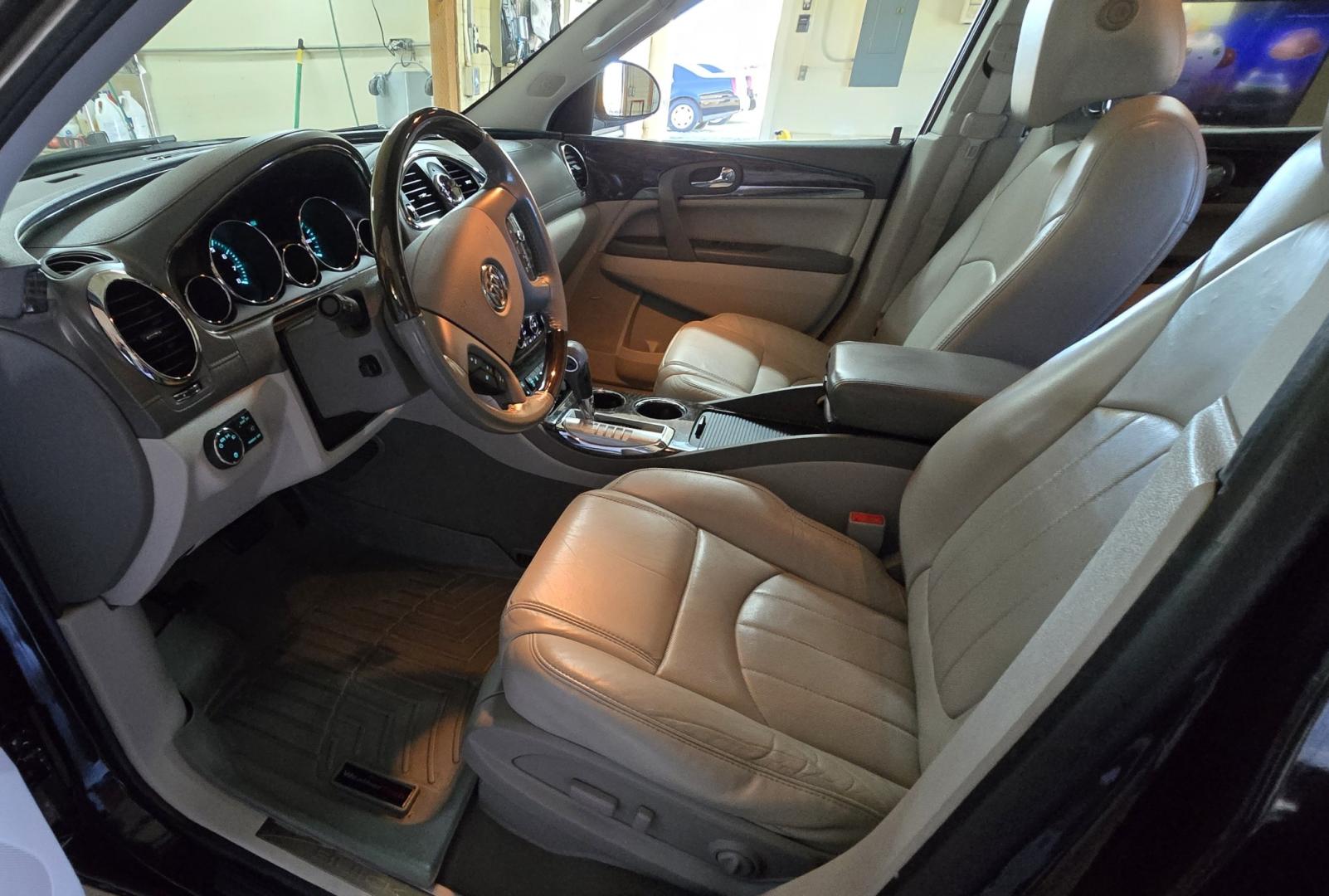 2014 Grey /Gray Buick Enclave Premium AWD (5GAKVCKD4EJ) with an 3.6L V6 DOHC 24V engine, 6-Speed Automatic Overdrive transmission, located at 450 N Russell, Missoula, MT, 59801, (406) 543-6600, 46.874496, -114.017433 - Gorgeous Dark Metallic Gray AWD Buick Enclave. Might be the nicest car on our lot. Reliable 3.6L V6 Engine. 6 Speed Automatic Overdrive Transmission. Panoramic Sunroof. Navigation. 3rd Row Seats. Middle Bucket Seats. Front Seats are Heated and Cooled. Navigation. AM FM XM CD Player, Bluetooth Audio- Photo#11
