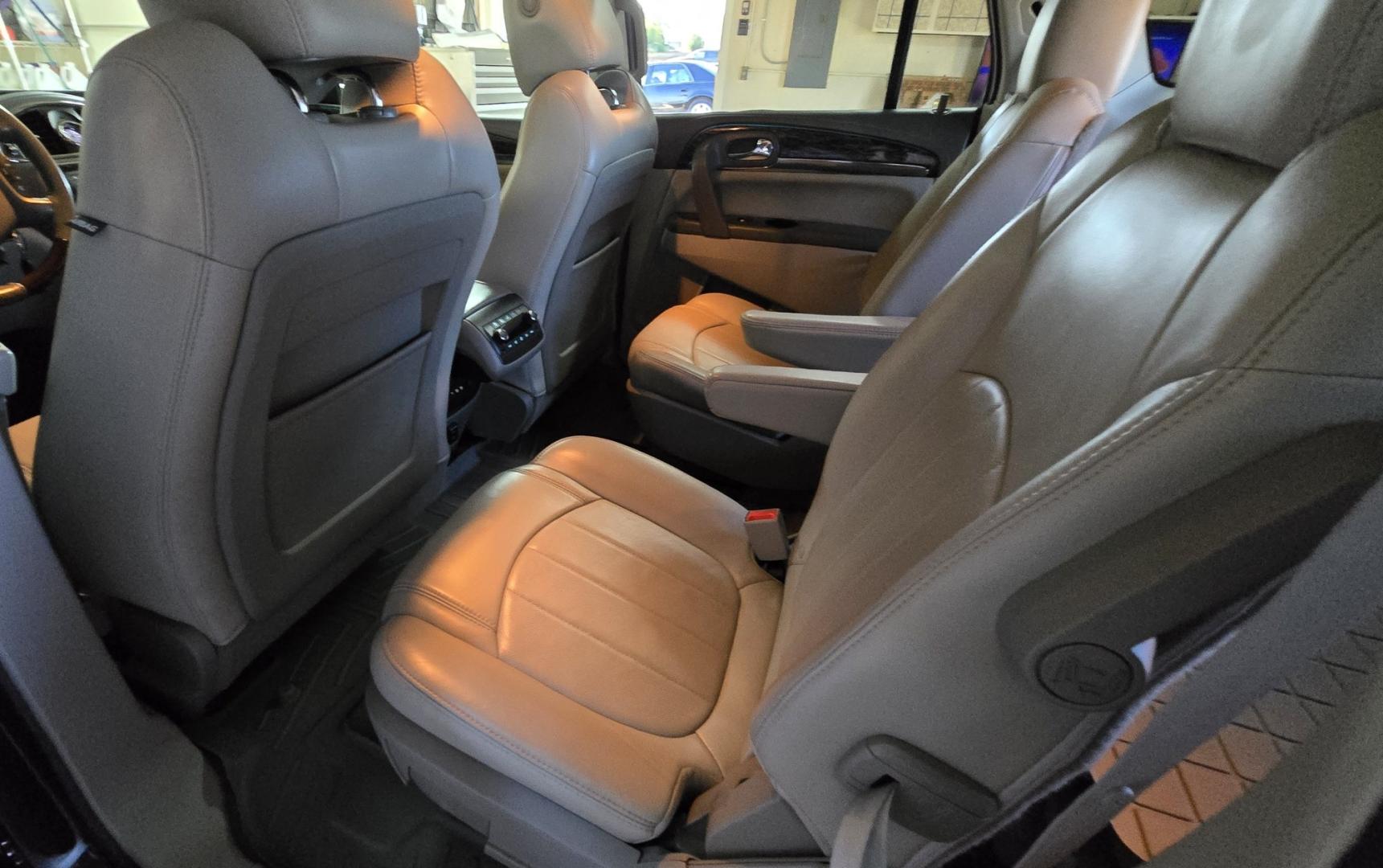 2014 Grey /Gray Buick Enclave Premium AWD (5GAKVCKD4EJ) with an 3.6L V6 DOHC 24V engine, 6-Speed Automatic Overdrive transmission, located at 450 N Russell, Missoula, MT, 59801, (406) 543-6600, 46.874496, -114.017433 - Gorgeous Dark Metallic Gray AWD Buick Enclave. Might be the nicest car on our lot. Reliable 3.6L V6 Engine. 6 Speed Automatic Overdrive Transmission. Panoramic Sunroof. Navigation. 3rd Row Seats. Middle Bucket Seats. Front Seats are Heated and Cooled. Navigation. AM FM XM CD Player, Bluetooth Audio- Photo#12