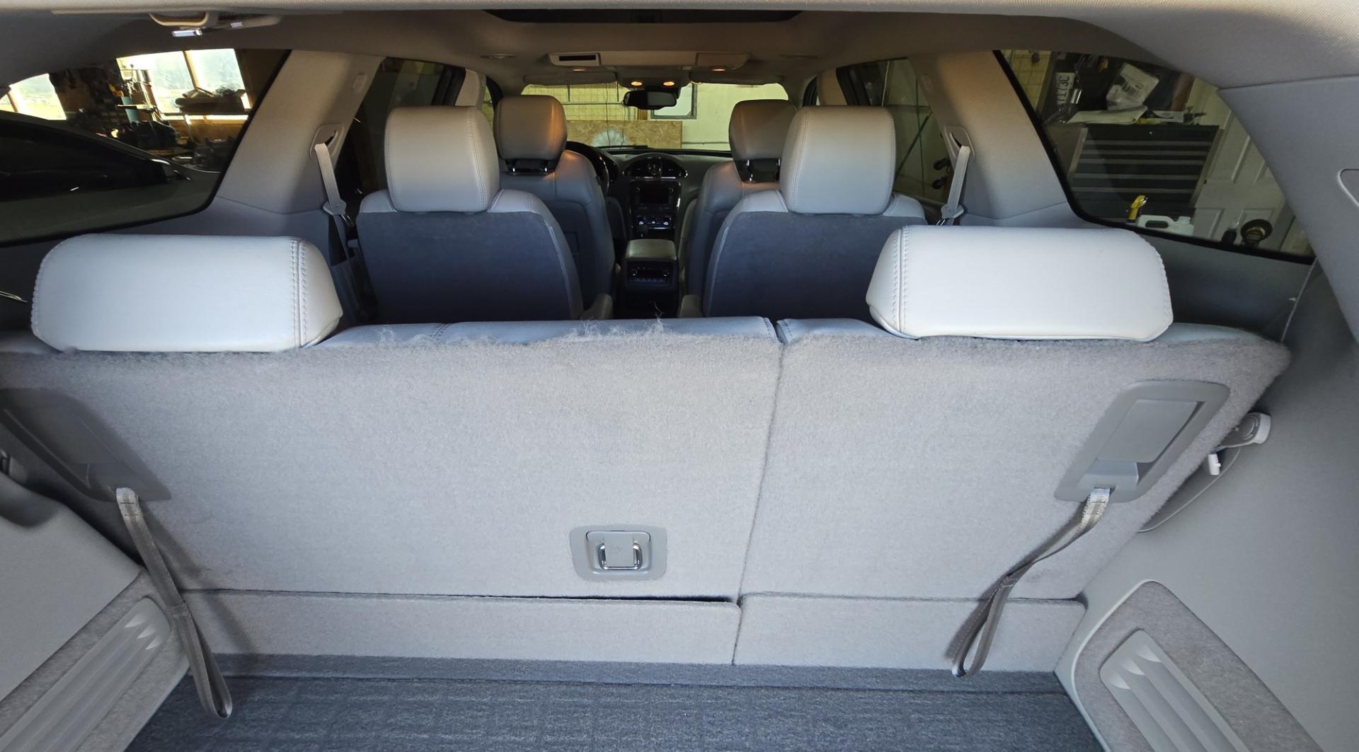 2014 Grey /Gray Buick Enclave Premium AWD (5GAKVCKD4EJ) with an 3.6L V6 DOHC 24V engine, 6-Speed Automatic Overdrive transmission, located at 450 N Russell, Missoula, MT, 59801, (406) 543-6600, 46.874496, -114.017433 - Gorgeous Dark Metallic Gray AWD Buick Enclave. Might be the nicest car on our lot. Reliable 3.6L V6 Engine. 6 Speed Automatic Overdrive Transmission. Panoramic Sunroof. Navigation. 3rd Row Seats. Middle Bucket Seats. Front Seats are Heated and Cooled. Navigation. AM FM XM CD Player, Bluetooth Audio- Photo#16