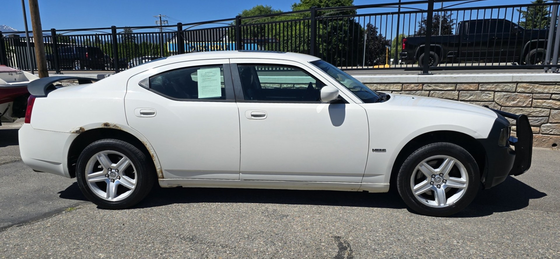 2008 White /Black Dodge Charger R/T AWD (2B3KK53H68H) with an 5.7L V8 OHV 16V engine, Automatic transmission, located at 450 N Russell, Missoula, MT, 59801, (406) 543-6600, 46.874496, -114.017433 - Yup. It's Got a Hemi. Former Law Enforcement Charger. 5.7L V8 that runs and sounds amazing. Sunroof. Remote Engine Start. Aftermarket Touch Screen Stereo. Power Windows and Locks. Air Conditioning.Heated Front Seats. Huge Trunk, Cruise Control. Has some rust but this baby scoots right down the road- Photo#6