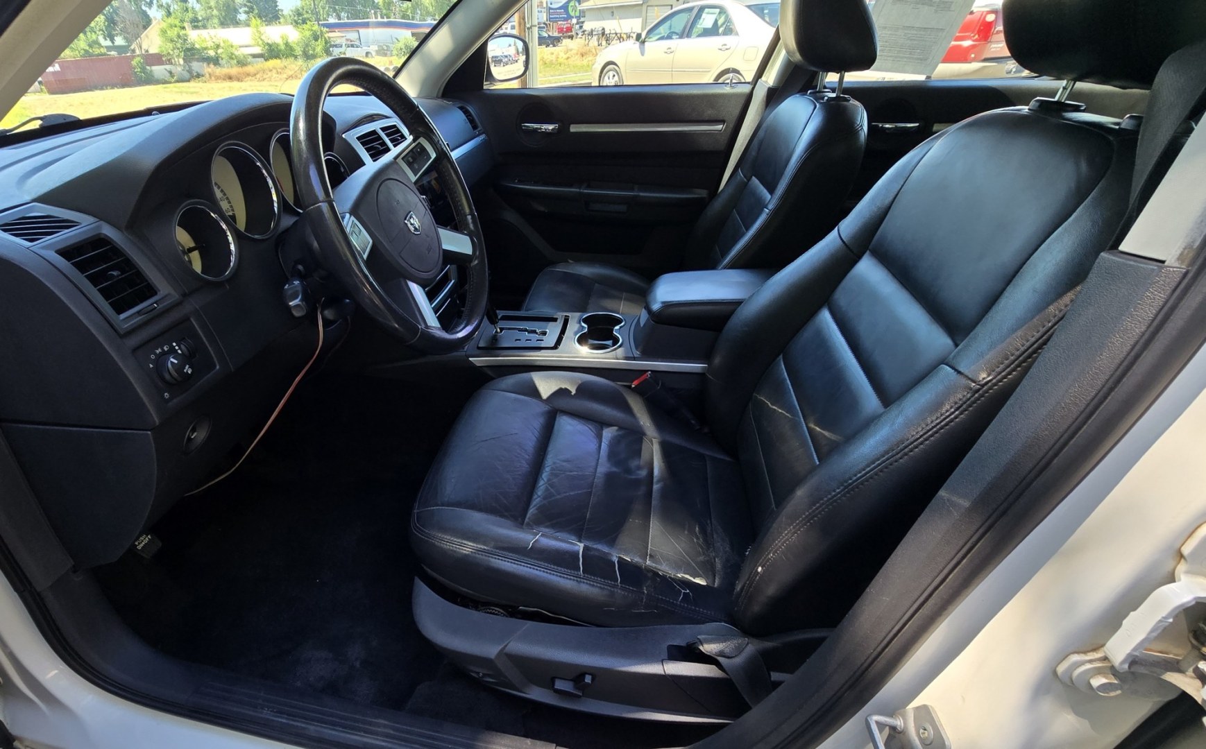 2008 White /Black Dodge Charger R/T AWD (2B3KK53H68H) with an 5.7L V8 OHV 16V engine, Automatic transmission, located at 450 N Russell, Missoula, MT, 59801, (406) 543-6600, 46.874496, -114.017433 - Yup. It's Got a Hemi. Former Law Enforcement Charger. 5.7L V8 that runs and sounds amazing. Sunroof. Remote Engine Start. Aftermarket Touch Screen Stereo. Power Windows and Locks. Air Conditioning.Heated Front Seats. Huge Trunk, Cruise Control. Has some rust but this baby scoots right down the road- Photo#9