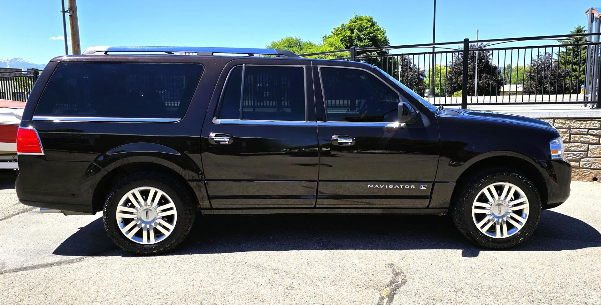 2013 Brown /Brown Lincoln Navigator L L 4WD (5LMJJ3J58DE) with an 5.4L V8 SOHC 24V engine, 6-Speed Automatic transmission, located at 450 N Russell, Missoula, MT, 59801, (406) 543-6600, 46.874496, -114.017433 - Gorgeous Metallic Kodiak Brown 4WD SUV with a 5.4L V8 Engine. Seats Eight People with room to spare. Nice Brown Leather Interior. Heated and Cooled Front Power Seats. Heated Middle Seats. Moon Roof. Navigation. 6 CD Changer. Touch Screen Stereo. Adjustable Foot Pedals. Front and Rear Climate Control- Photo#6