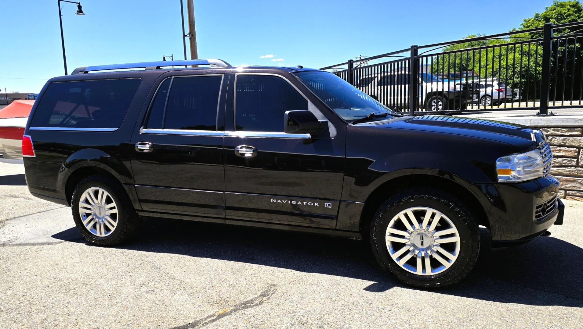 2013 Brown /Brown Lincoln Navigator L L 4WD (5LMJJ3J58DE) with an 5.4L V8 SOHC 24V engine, 6-Speed Automatic transmission, located at 450 N Russell, Missoula, MT, 59801, (406) 543-6600, 46.874496, -114.017433 - Gorgeous Metallic Kodiak Brown 4WD SUV with a 5.4L V8 Engine. Seats Eight People with room to spare. Nice Brown Leather Interior. Heated and Cooled Front Power Seats. Heated Middle Seats. Moon Roof. Navigation. 6 CD Changer. Touch Screen Stereo. Adjustable Foot Pedals. Front and Rear Climate Control- Photo#7