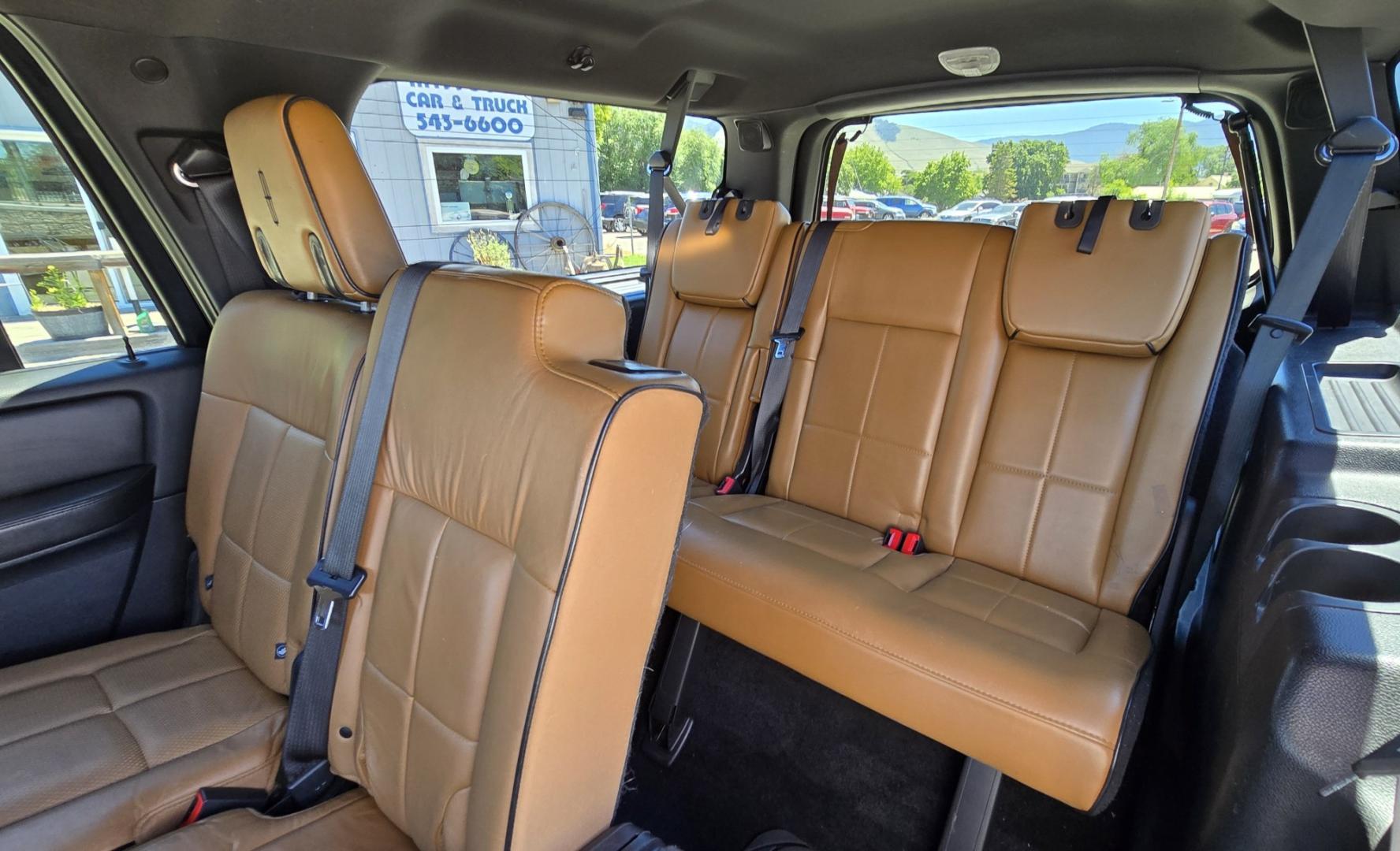 2013 Brown /Brown Lincoln Navigator L L 4WD (5LMJJ3J58DE) with an 5.4L V8 SOHC 24V engine, 6-Speed Automatic transmission, located at 450 N Russell, Missoula, MT, 59801, (406) 543-6600, 46.874496, -114.017433 - Gorgeous Metallic Kodiak Brown 4WD SUV with a 5.4L V8 Engine. Seats Eight People with room to spare. Nice Brown Leather Interior. Heated and Cooled Front Power Seats. Heated Middle Seats. Moon Roof. Navigation. 6 CD Changer. Touch Screen Stereo. Adjustable Foot Pedals. Front and Rear Climate Control- Photo#12