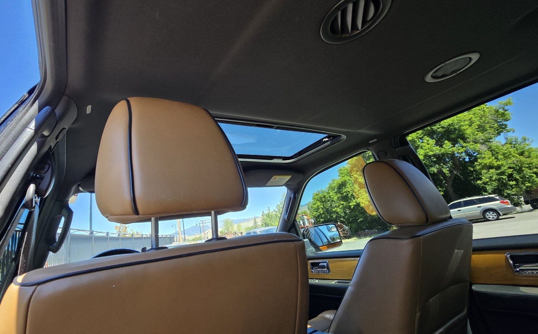 2013 Brown /Brown Lincoln Navigator L L 4WD (5LMJJ3J58DE) with an 5.4L V8 SOHC 24V engine, 6-Speed Automatic transmission, located at 450 N Russell, Missoula, MT, 59801, (406) 543-6600, 46.874496, -114.017433 - Gorgeous Metallic Kodiak Brown 4WD SUV with a 5.4L V8 Engine. Seats Eight People with room to spare. Nice Brown Leather Interior. Heated and Cooled Front Power Seats. Heated Middle Seats. Moon Roof. Navigation. 6 CD Changer. Touch Screen Stereo. Adjustable Foot Pedals. Front and Rear Climate Control- Photo#13