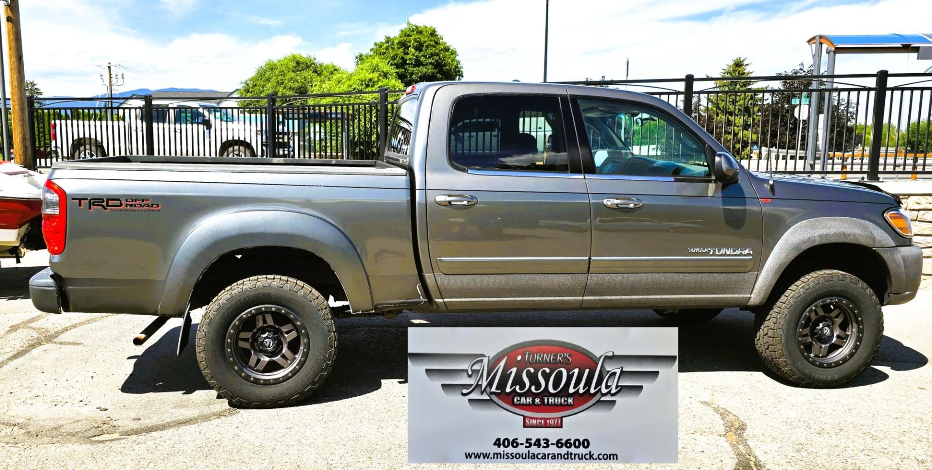 2004 Grey /Gray Toyota Tundra SR5 Double Cab 4WD (5TBDT44104S) with an 4.7L V8 DOHC 32V engine, 4A OD transmission, located at 450 N Russell, Missoula, MT, 59801, (406) 543-6600, 46.874496, -114.017433 - Highly Desirable Toyota Tundra 4WD. 4.7L V8 Engine. Automatic Transmission. Nice Aftermarket Fuel brand Wheels with Excellent Cooper Tires. Air Conditioning. AM FM Bluetooth Touch Screen Stereo with Backup Camera. Power Windows and Locks. Cruise Control. Comes with a Winch and the Winch Mount. It's- Photo#0