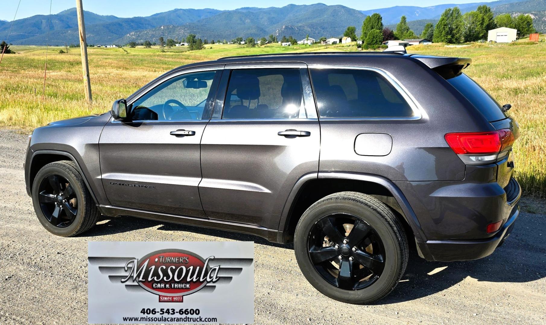 2014 Grey /Black Jeep Grand Cherokee Laredo 4WD (1C4RJFAG3EC) with an 3.6L V6 DOHC 24V engine, 5-Speed Automatic transmission, located at 450 N Russell, Missoula, MT, 59801, (406) 543-6600, 46.874496, -114.017433 - Stylish Jeep Grand Cherokee Altitude AWD. Reliable 3.6L V6 Engine. Heated Front Seats. Heated Steering Wheel. Power Sunroof. Power Windows and Locks. AM FM XM. Bluetooth Audio and Phone Connection. Toyo Tires. Power Liftgate. Very Comfortable to drive. We Finance through local Credit Unions. W- Photo#1